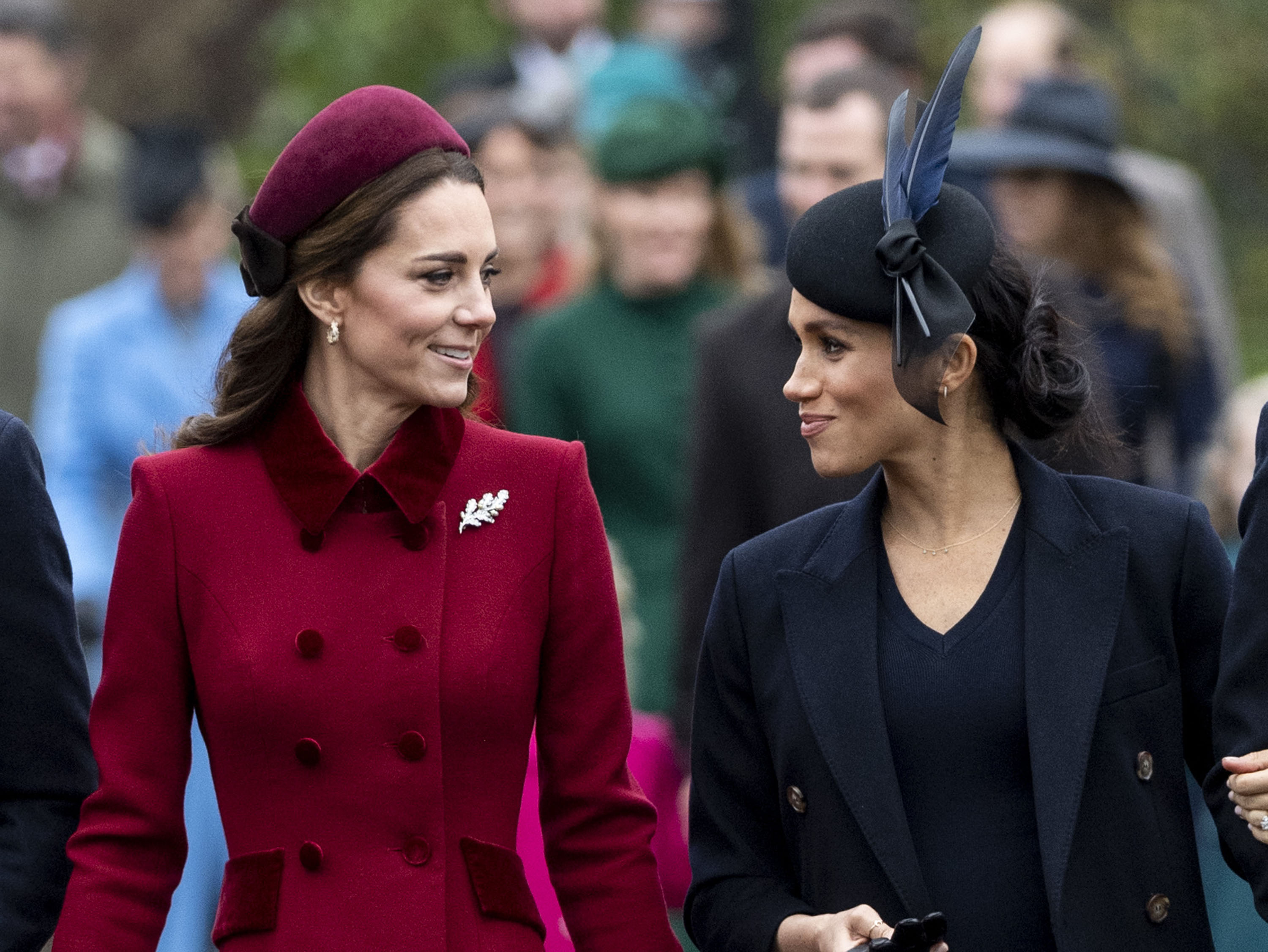 Kate Middleton and Meghan Markle walking to Christmas Day Church service on the Sandringham estate