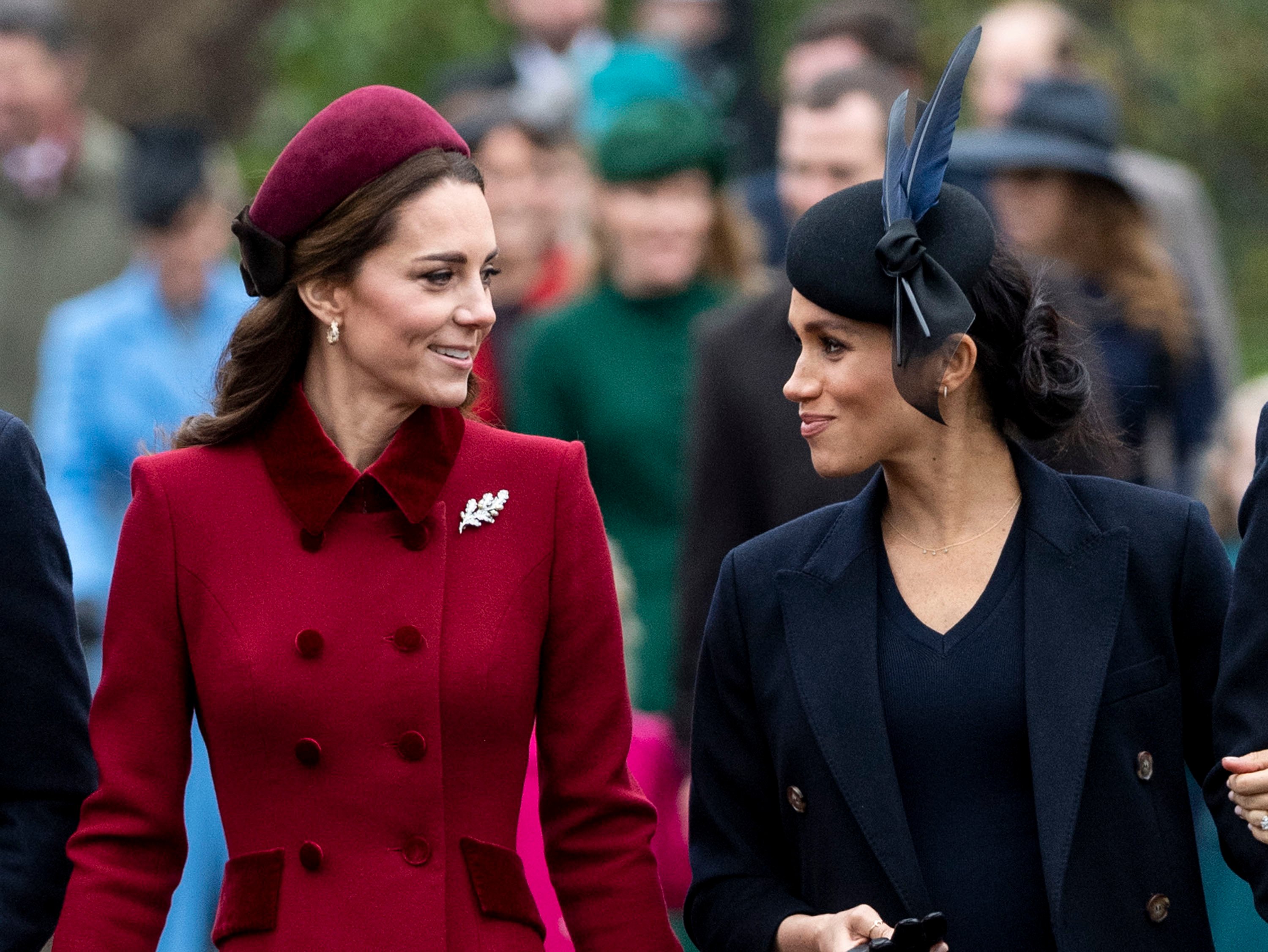 Kate Middleton and Meghan Markle walking to Christmas Day Church service on the Sandringham estate