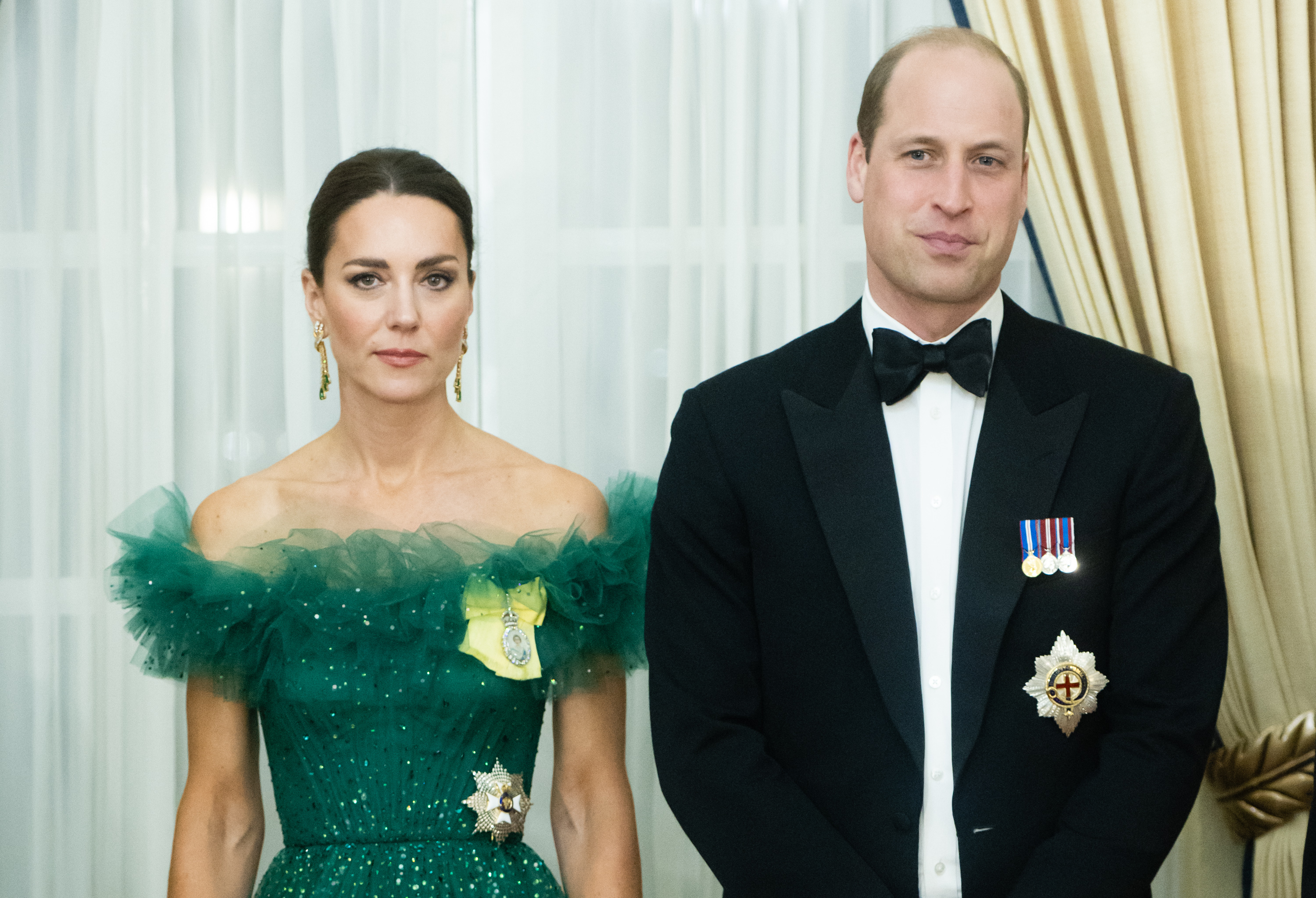 Kate Middleton and Prince William on tour in Jamaica dressed in formal attire for a dinner hosted by the Governor General