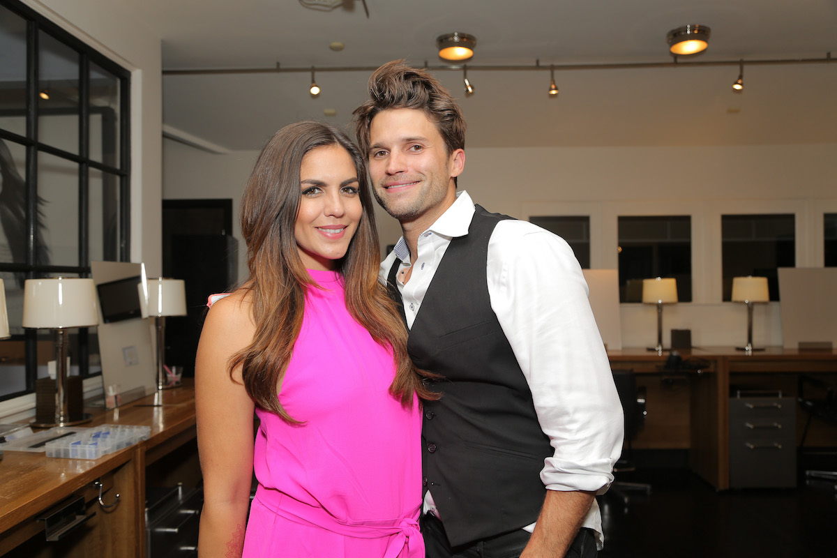 Katie Maloney and Tom Schwartz pose together at an event.