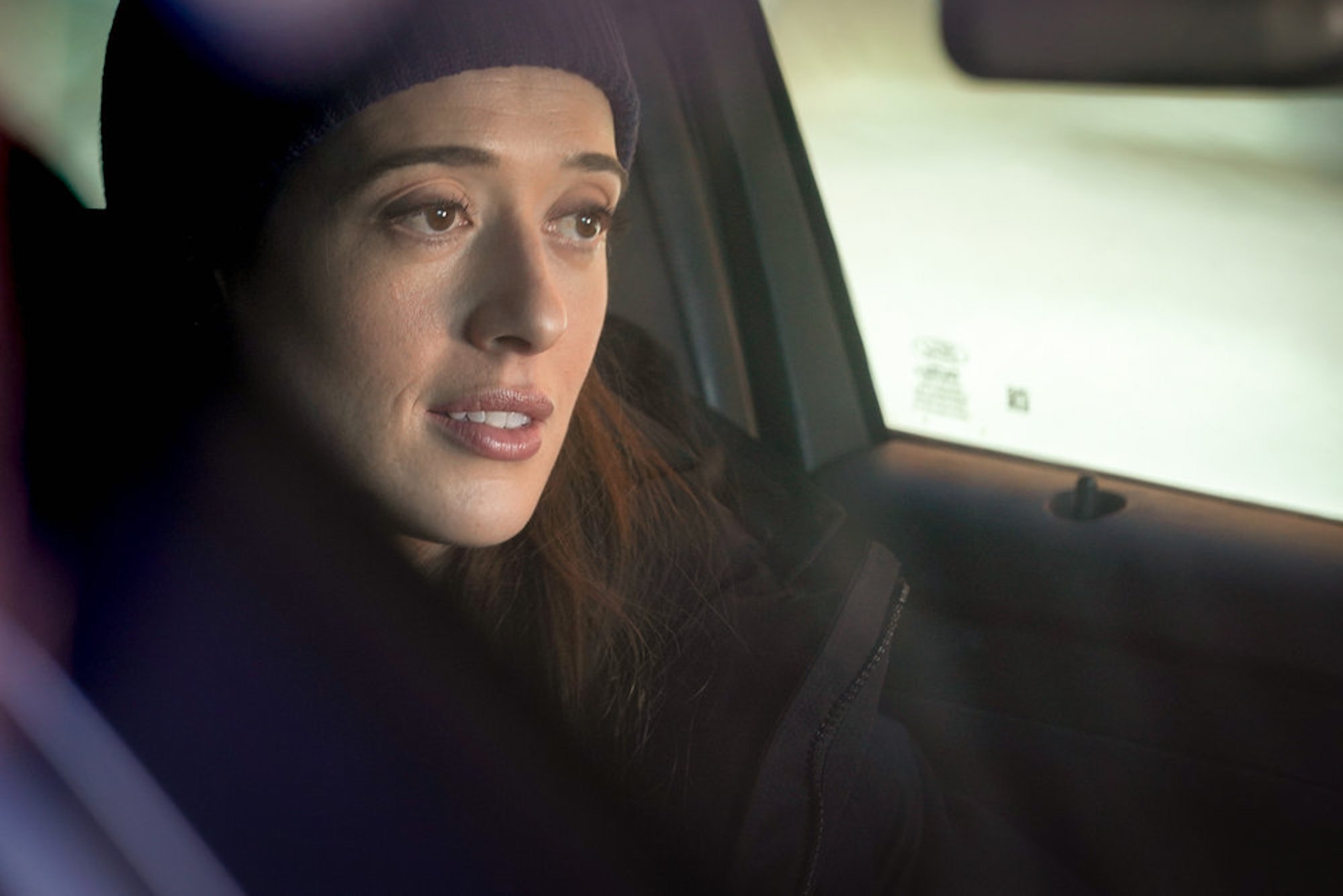 A close-up of Kim Burgess driving in 'Chicago P.D.' Season 9