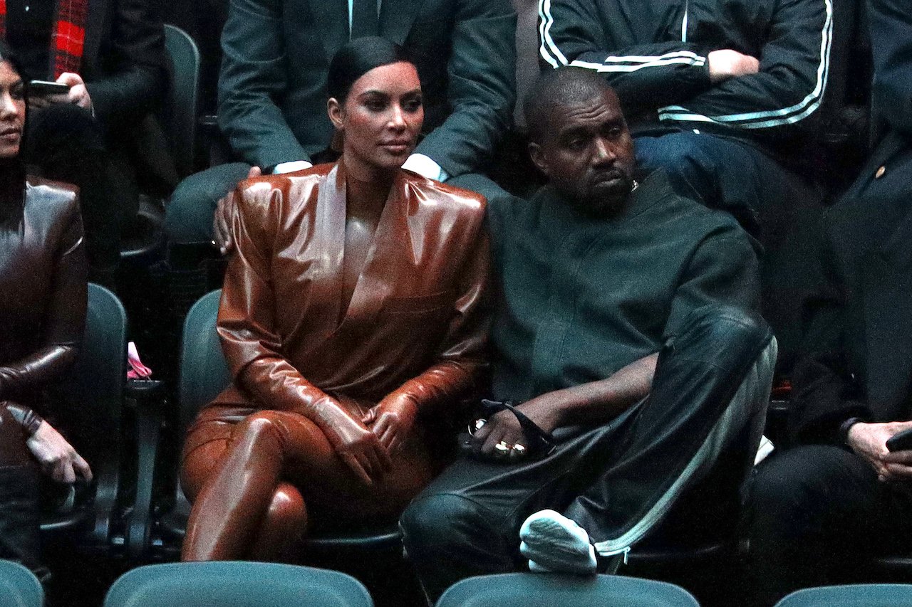Kim Kardashian and Kanye West caught off guard at fashion show