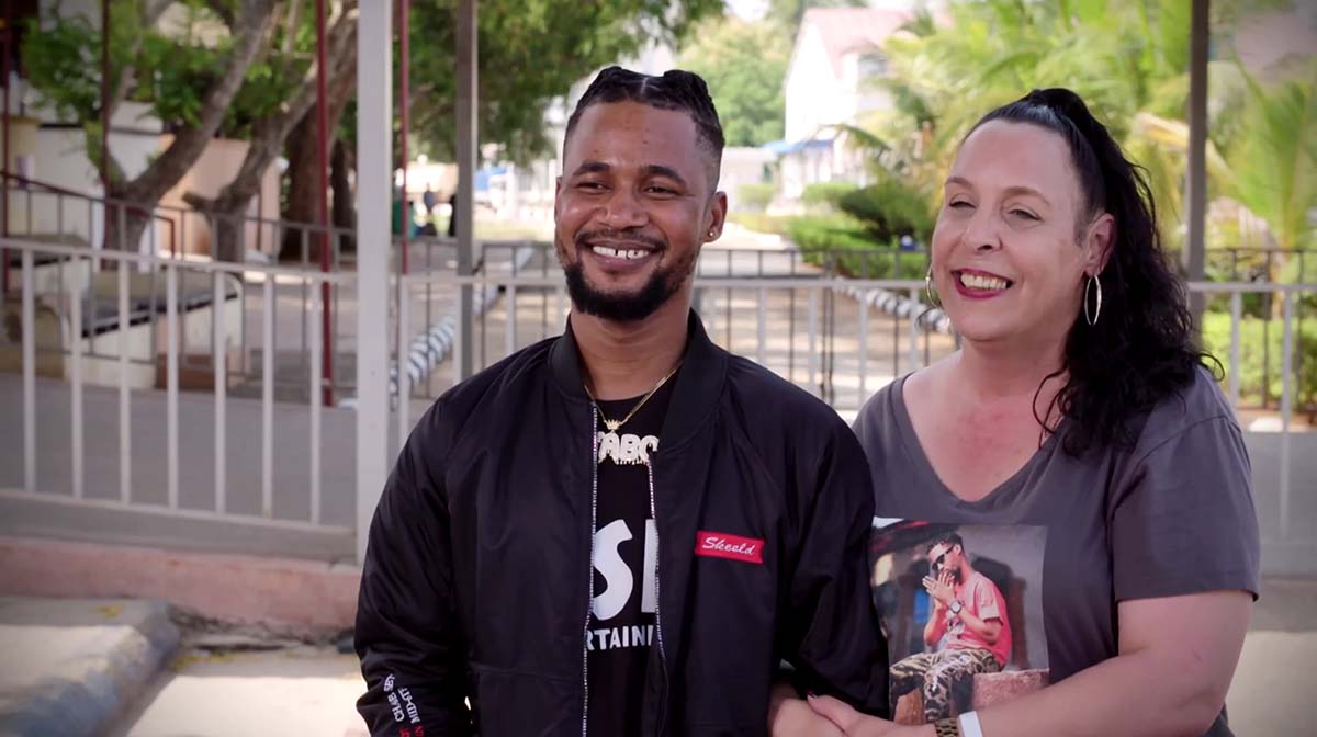 Usman 'Sojaboy' Umar wearing black and Kimberly wearing a grey shirt on '90 Day Fiancé: Before the 90 Days'.