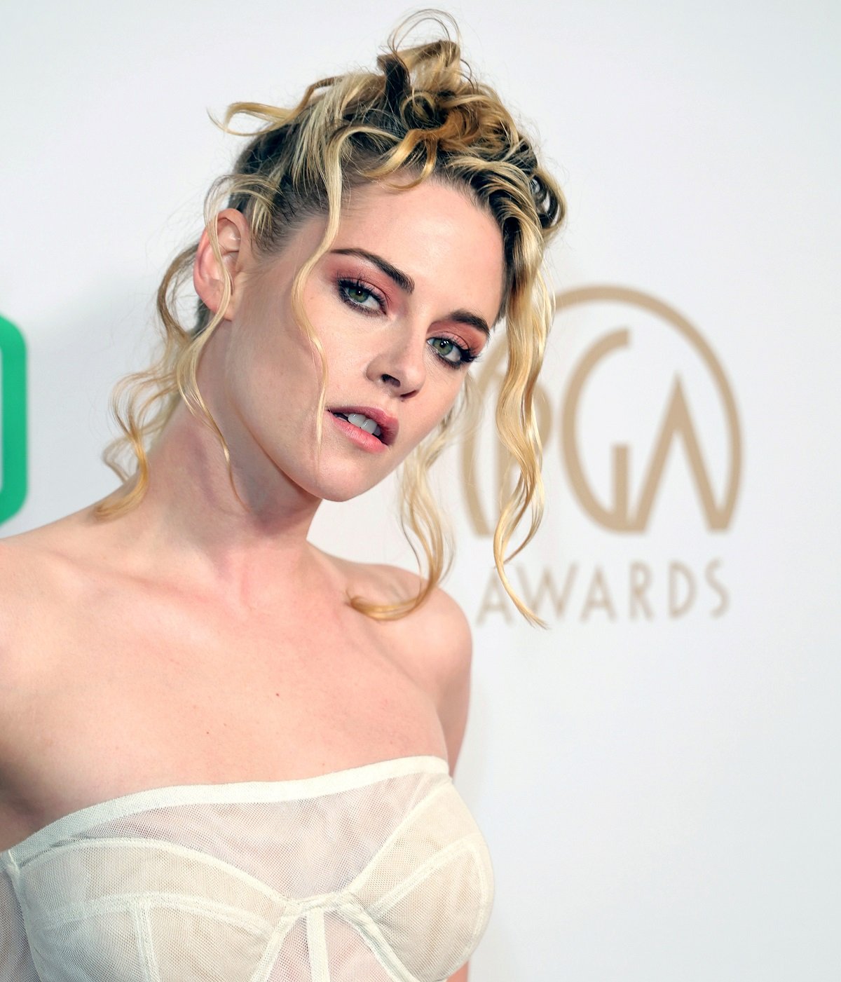 Kristen Stewart, who owns a Los Feliz mansion, poses on the red carpet at the 33rd Annual Producers Guild Awards