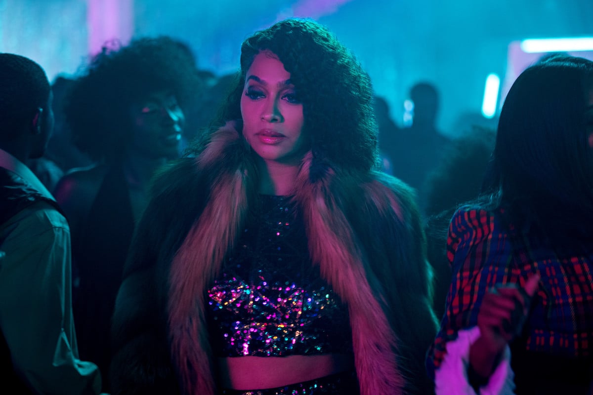 La La Anthony as Markisha Taylor wearing a sparkly crop top and fur in 'BMF'