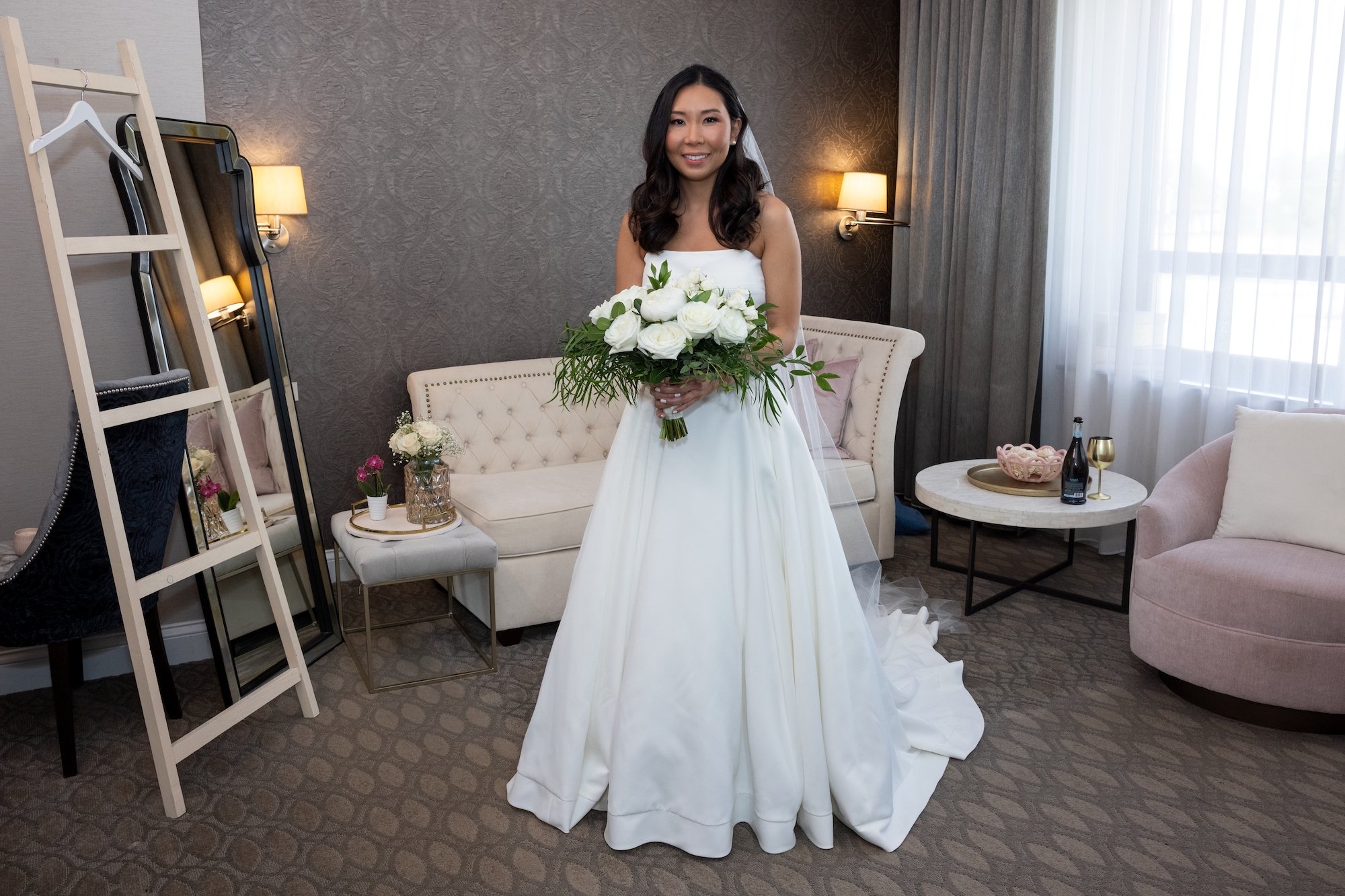 'Love is Blind' Season 2 star Natalie wearing her wedding dress and holding a bouquet.