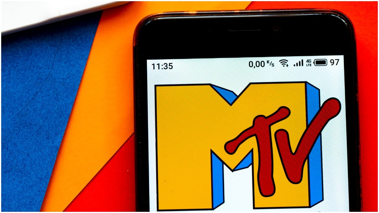 In this photo illustration a MTV logo seen displayed on a smartphone