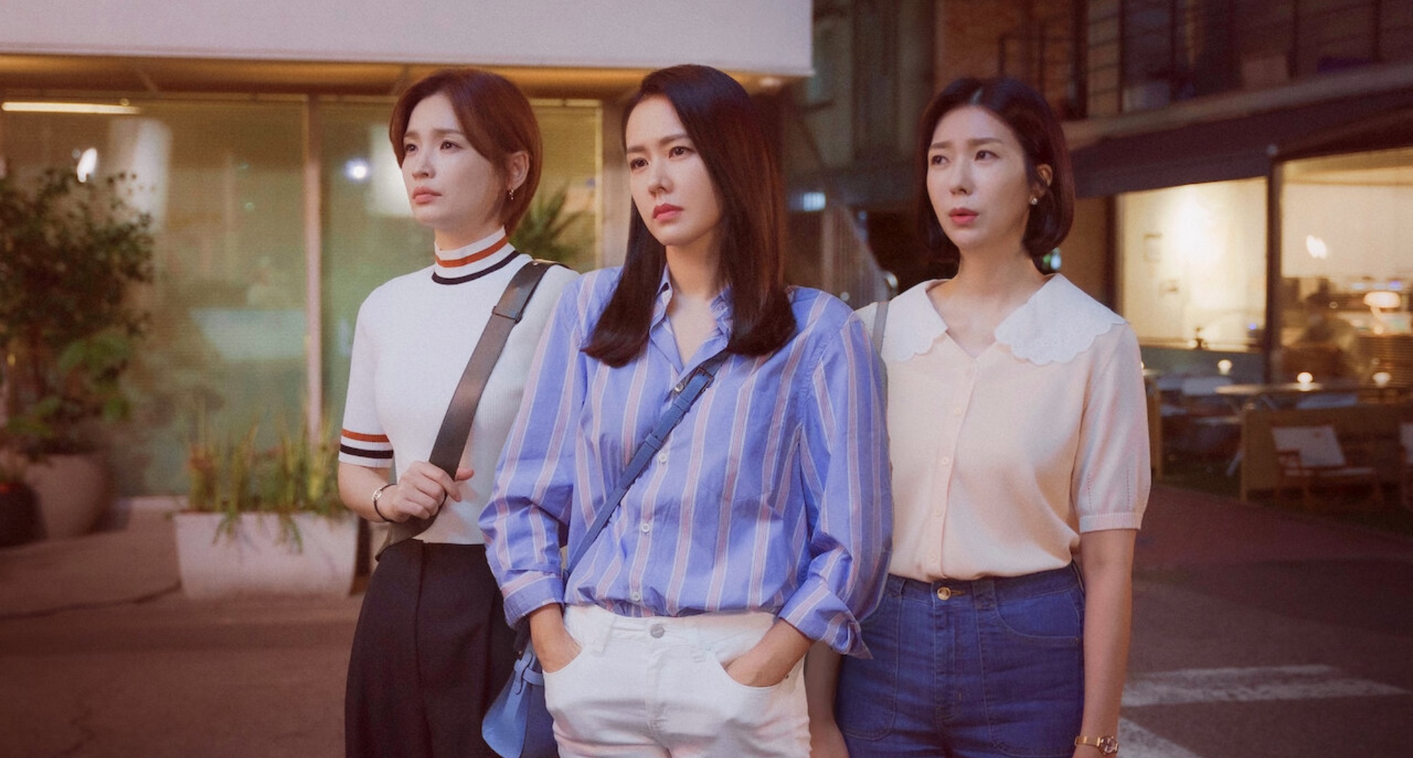 Main characters on 'Thirty-Nine' K-drama standing next to each other in street.