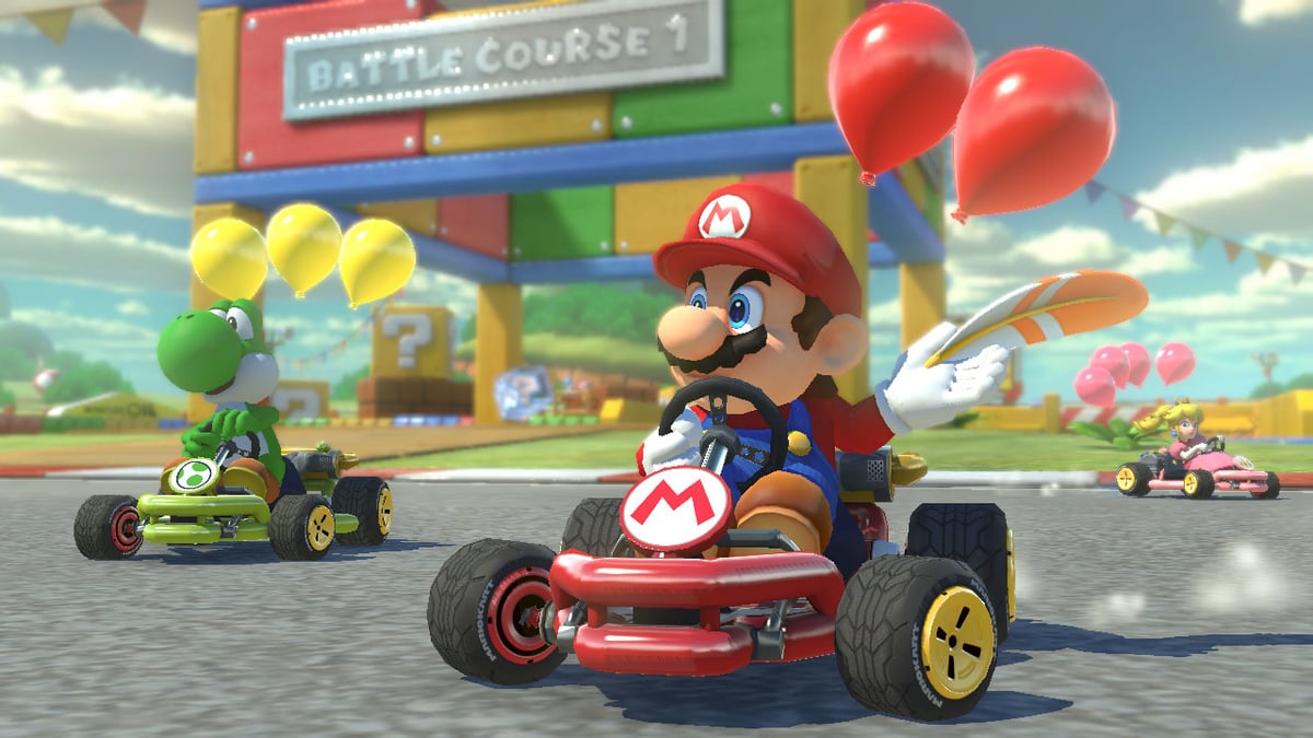 Yoshi, Mario, and Peach racing in 'Mario Kart 8 Deluxe' Booster  Pack DLC