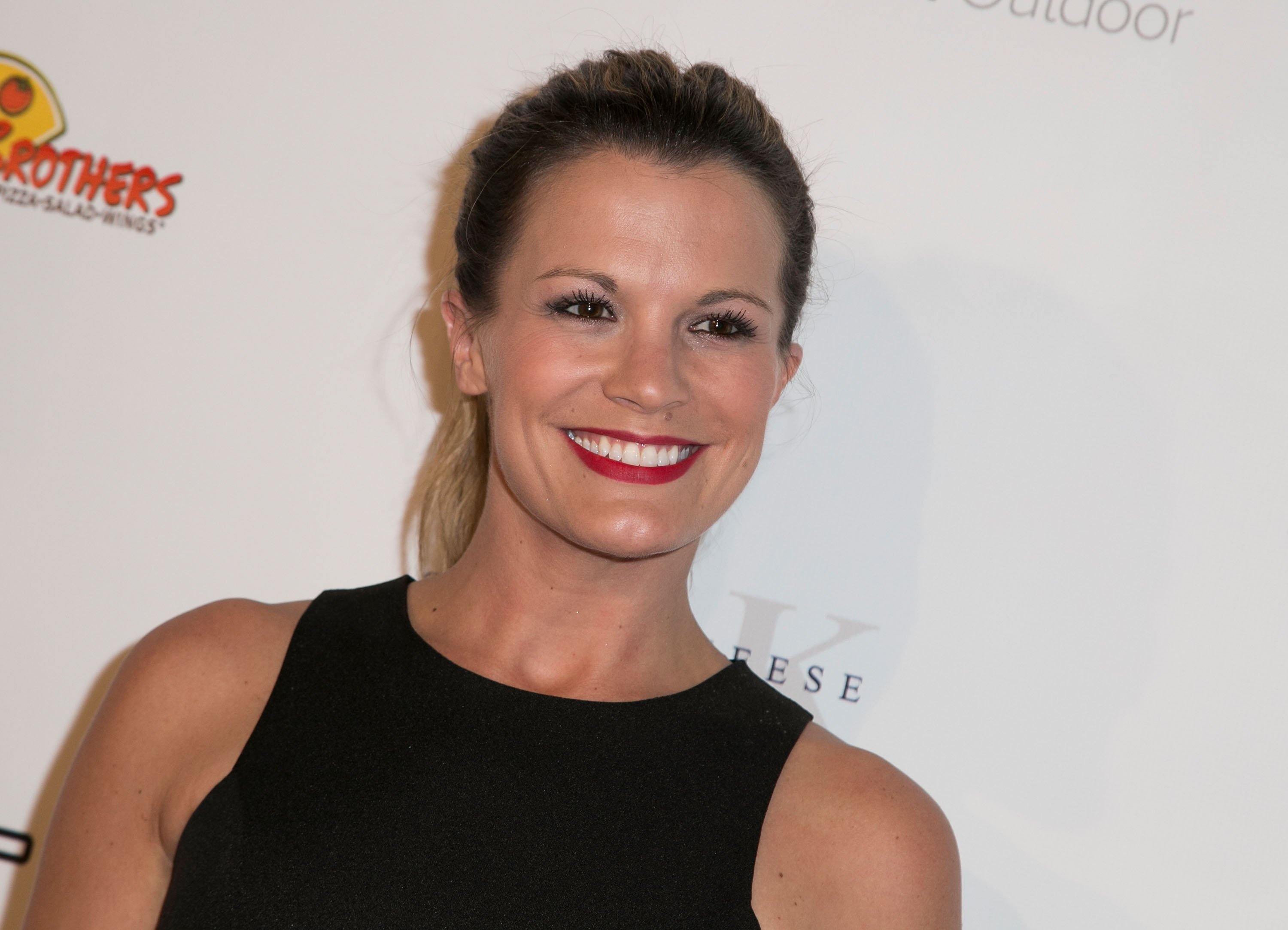 'The Young and the Restless' actor Melissa Claire Egan wearing a black dress during a red carpet appearance.