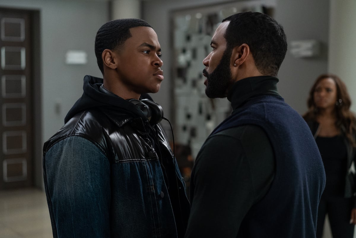 Michael Rainey Jr. as Tariq St. Patrick and Omari Hardwick as James "Ghost" St. Patrick wearing black and blue and having an intense conversation in 'Power'