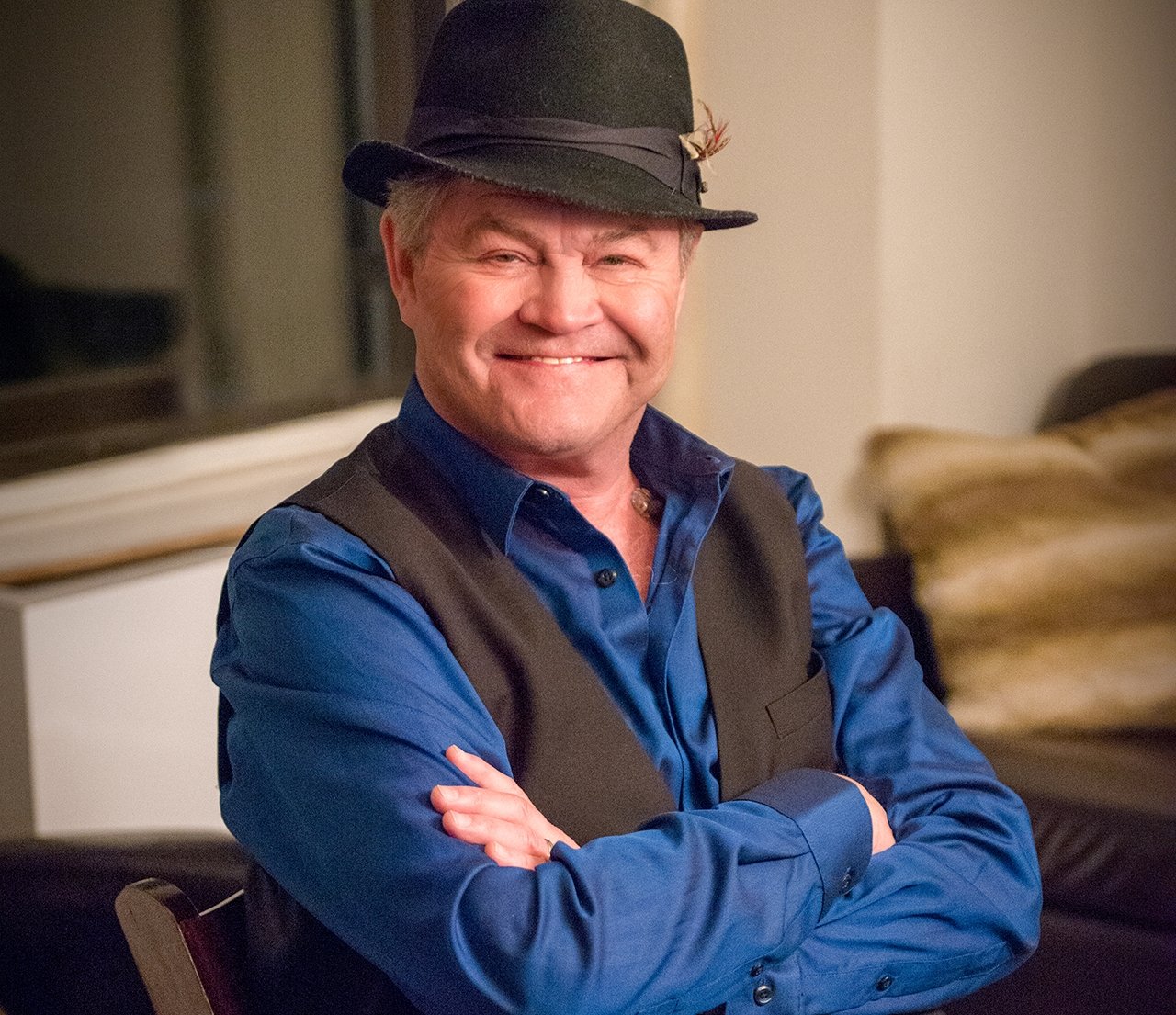 The Monkees' Micky Dolenz wearing a black hat