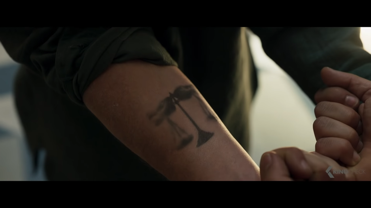 The Arthur Harrow (Ethan Hawke) tattoo of Ammut's Judgement of the Scales in 'Moon Knight'