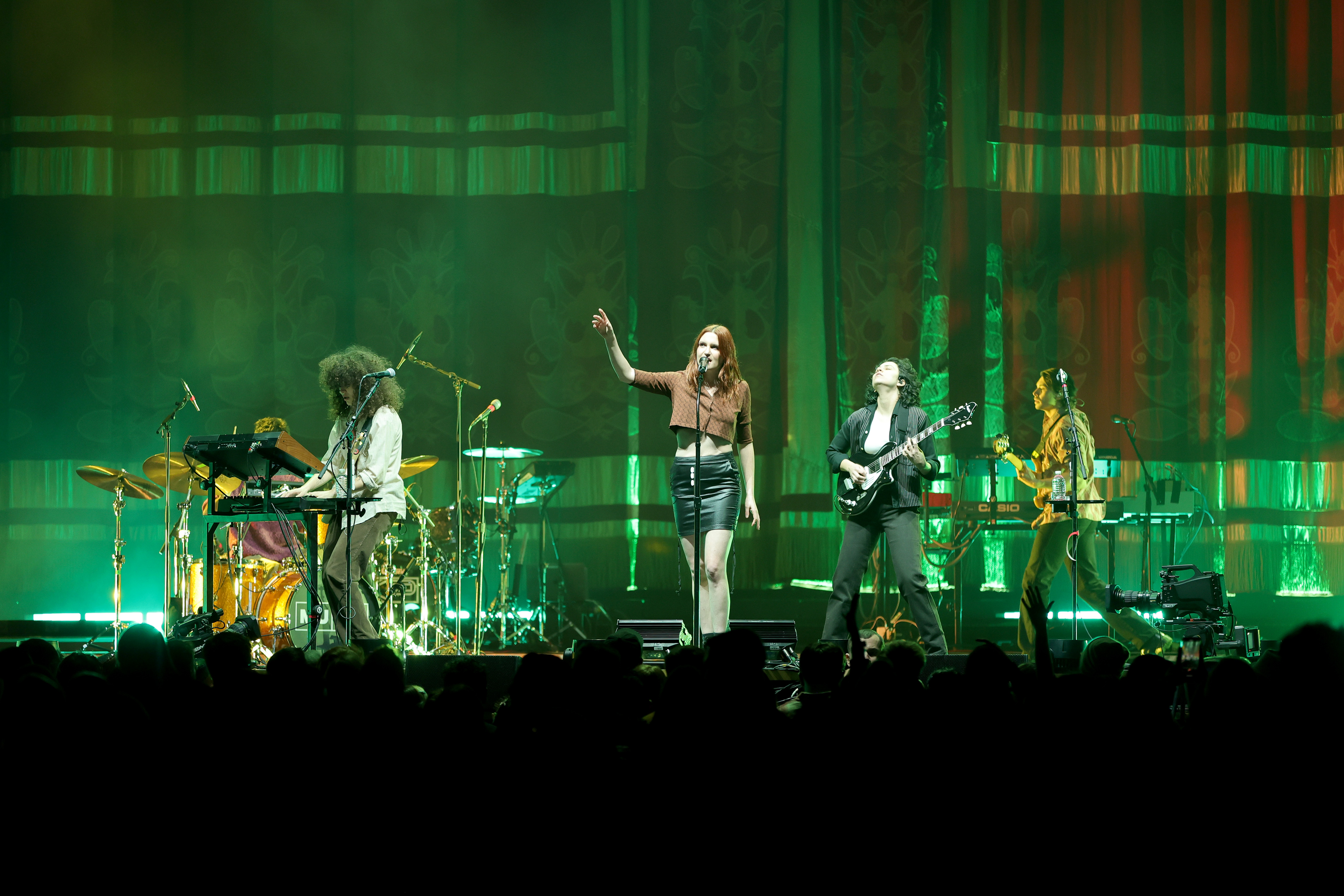 MUNA performs on stage during the Kacey Musgraves Star-Crossed: Unveiled Tour