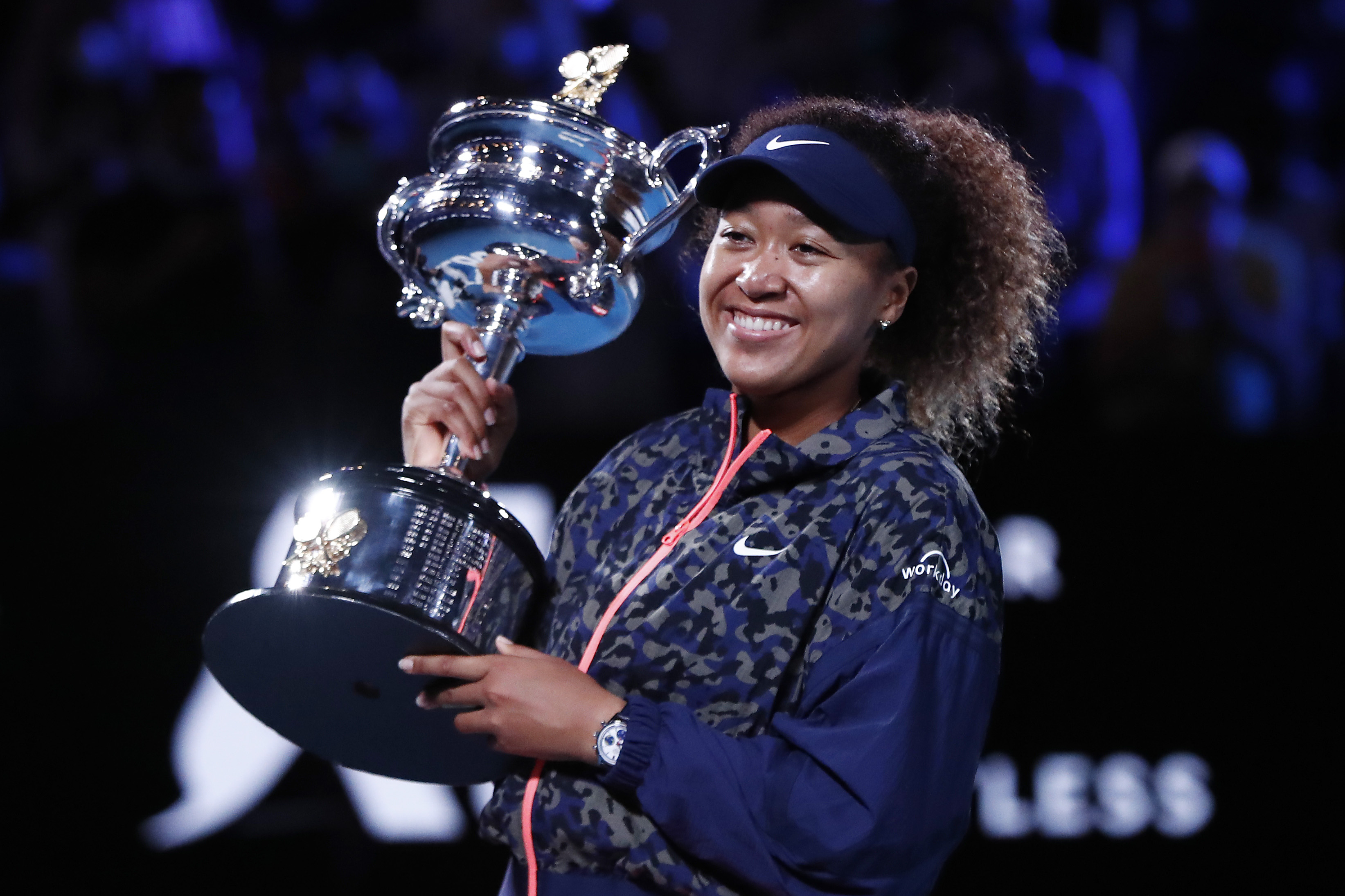 Naomi Osaka poses with the Daphne Akhurst Memorial Cup after winning the Australian Open