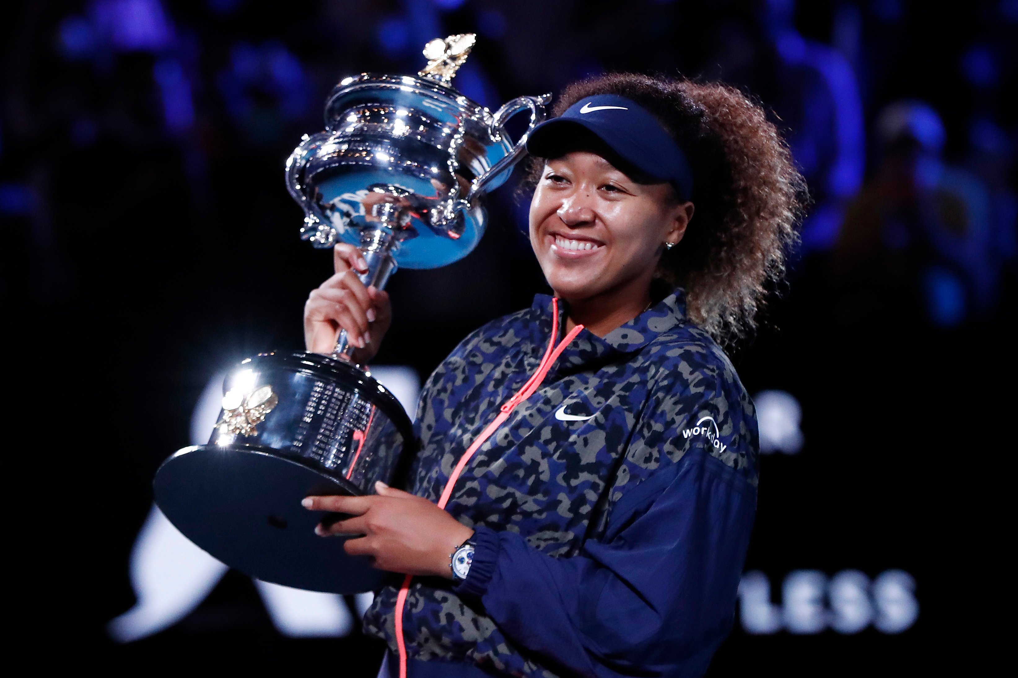 Naomi Osaka poses with the Daphne Akhurst Memorial Cup after winning the Australian Open