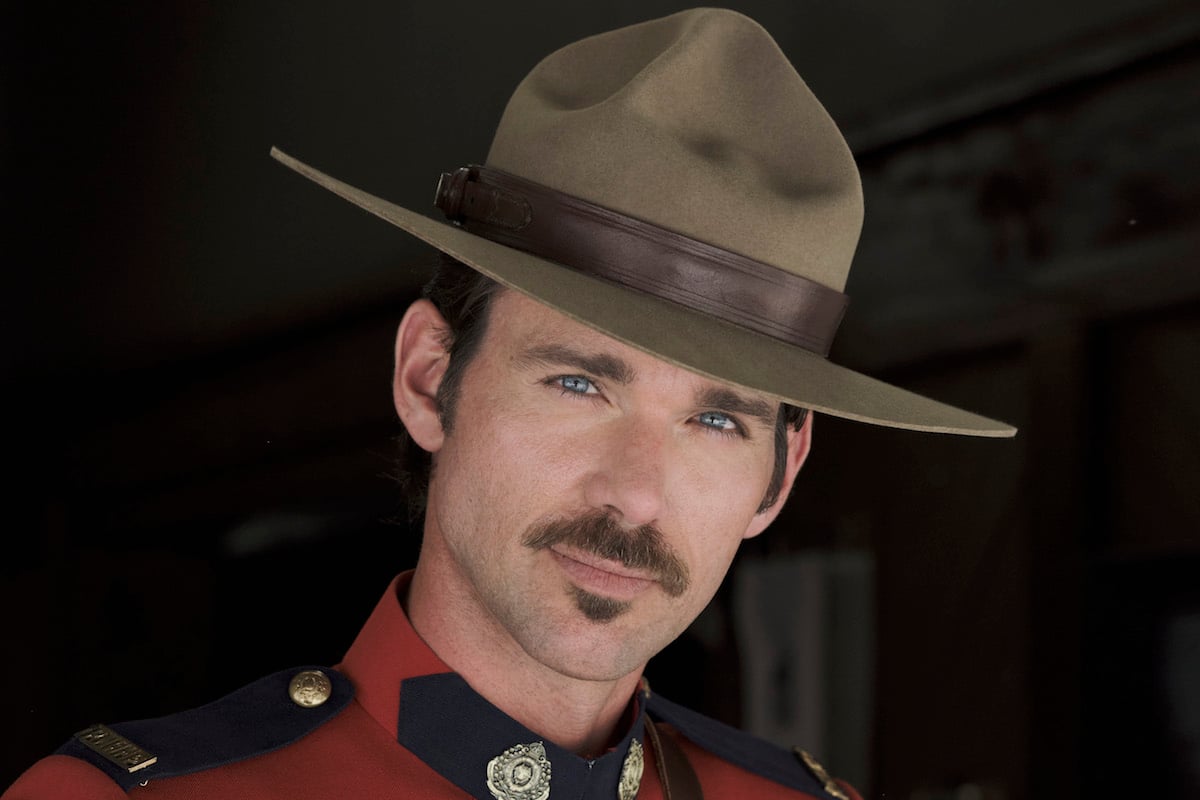 Nathan, wearing a hat and with a mustache, in 'When Calls the Heart'