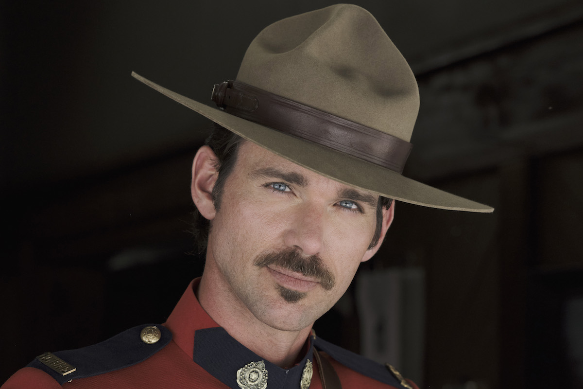 Nathan, wearing a hat and with a mustache, in 'When Calls the Heart'