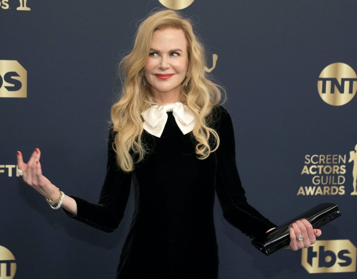'Being the Ricardos' star Nicole Kidman wears a black dress and poses on the red carpet