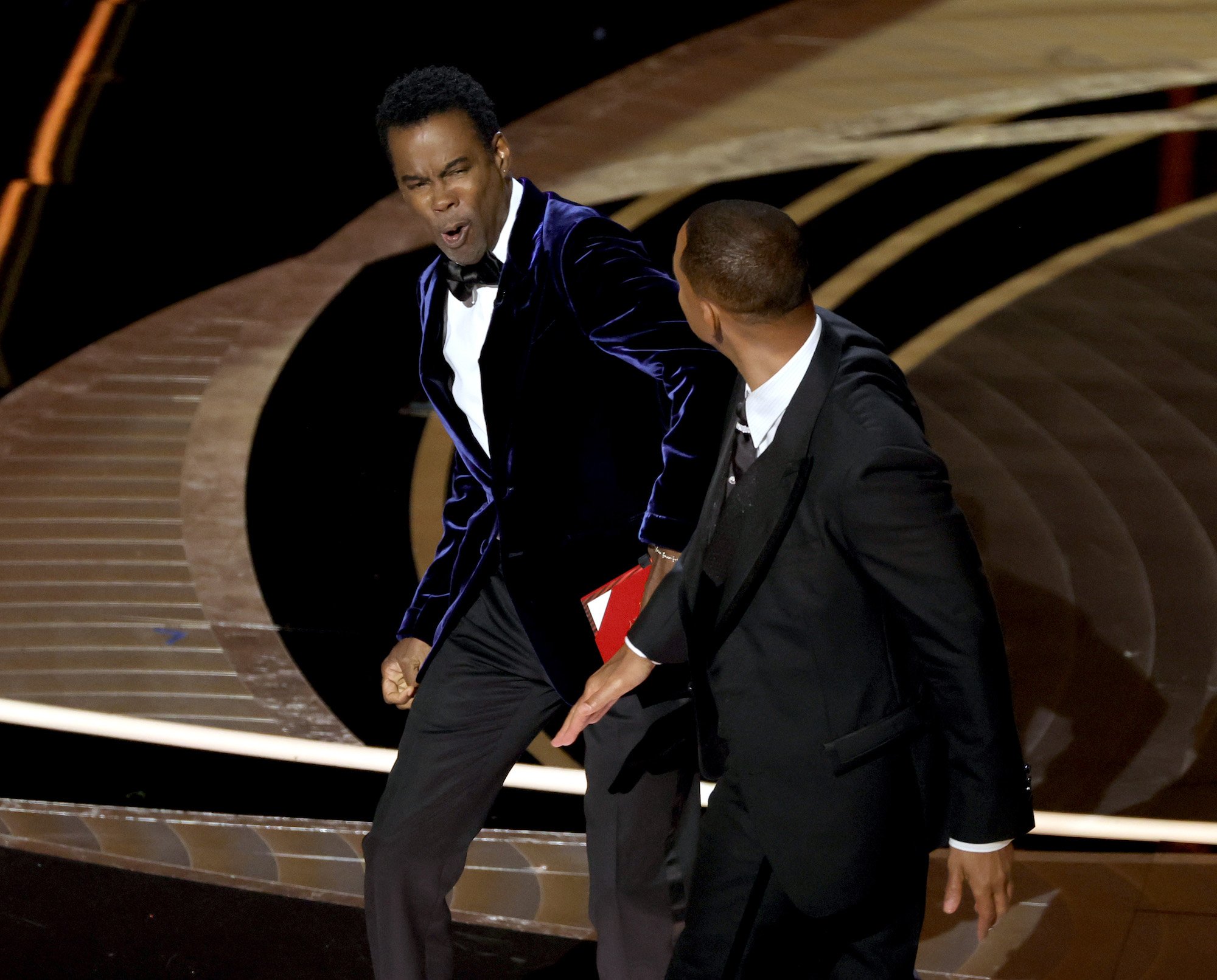 At the Oscars 2022 Will Smith is seen slapping Chris Rock on stage.