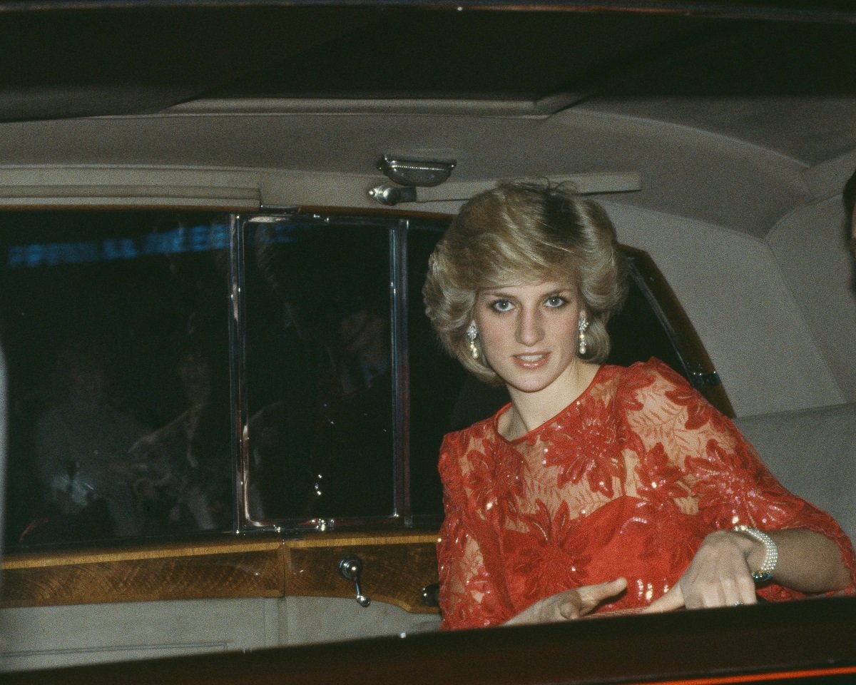 Princess Diana, who had a few nicknames during her life, sitting in the back of a car headed to a dinner party
