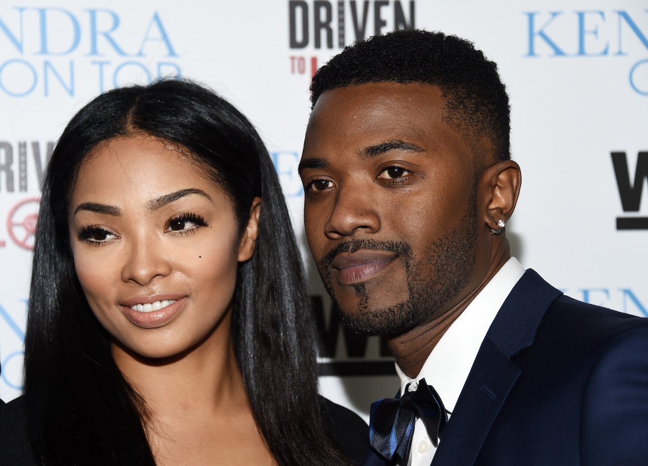 Princess Love and Ray J pose on the red carpet