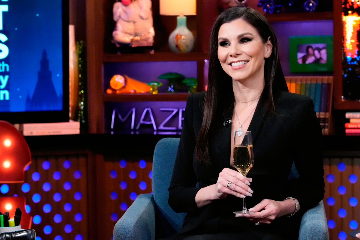Heather Dubrow wearing a chic black pantsuit during an appearance on Watch What Happens Live