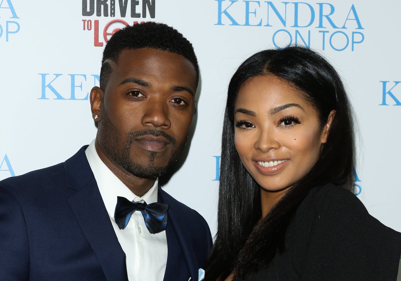 Ray J and Princess Love pose for photo