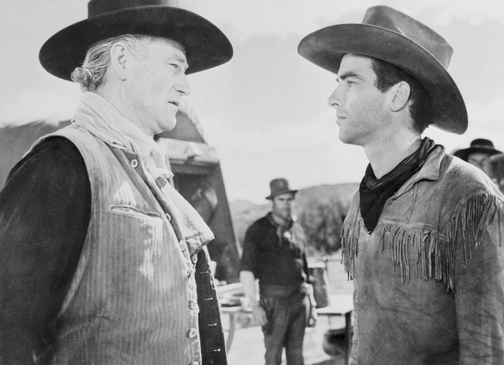 'Red River' John Wayne as Thomas Dunson and Montgomery Clift as Matt Garth facing each other in Western costumes