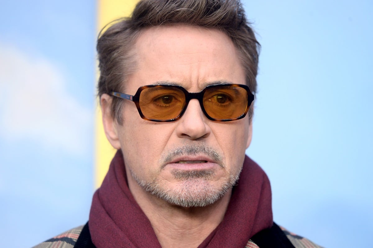 Robert Downey Jr posing while wearing shades.