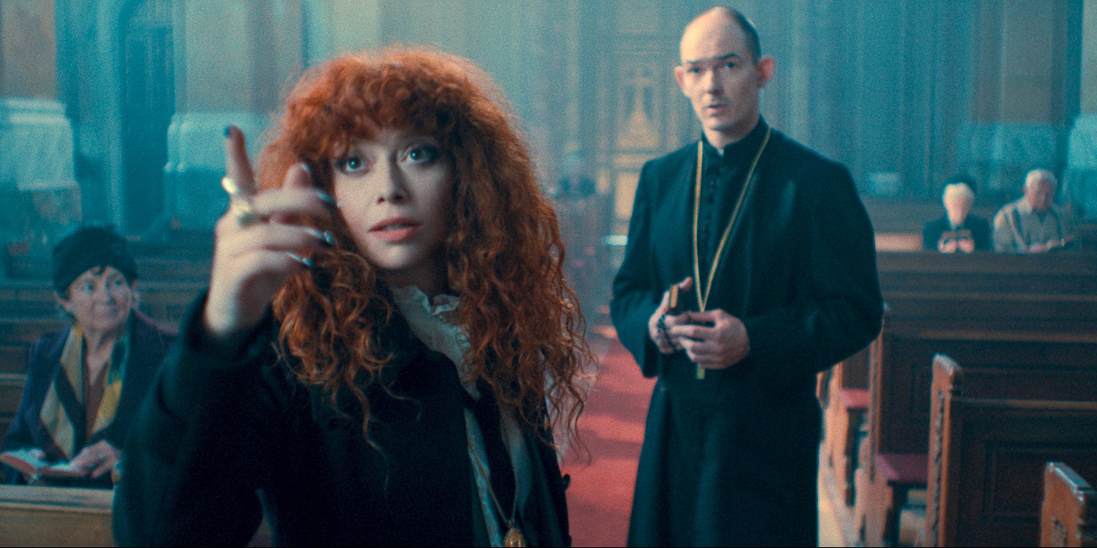 Natasha Lyonne as Nadia Vulvokov, Ákos Orosz as Father Laszlo in episode 205 of Russian Doll