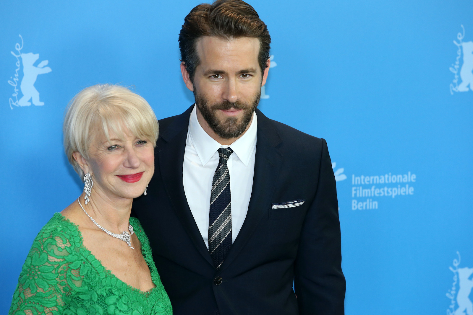 Helen Mirren and Ryan Reynolds smile on the red carpet during 'Woman in Gold' premiere