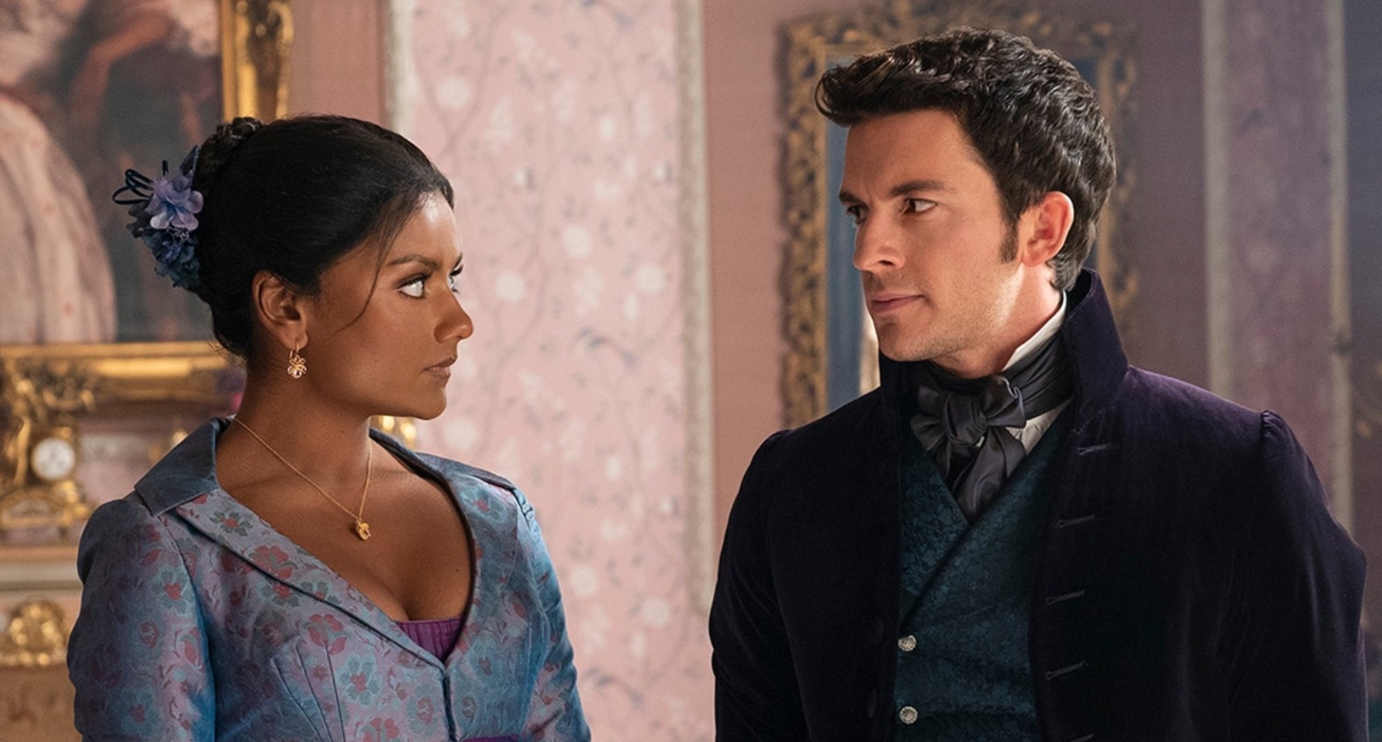 Simone Ashley and Jonathan Bailey in 'Bridgerton' Season 2 starring at each other in relation to Season 3.