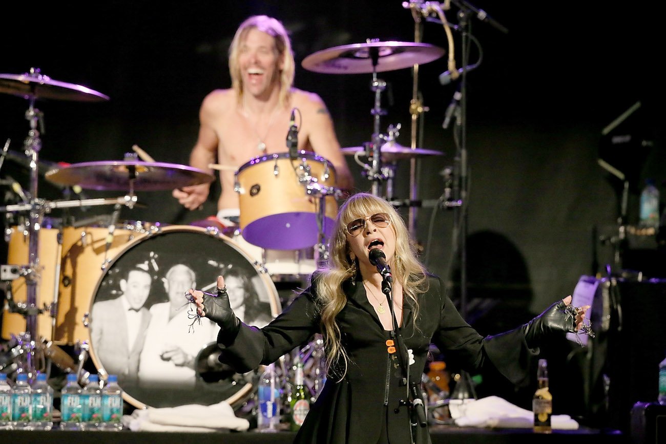 Stevie Nicks and Taylor Hawkins performing with Foo Fighters at the Southwest Music Festival in 2013.