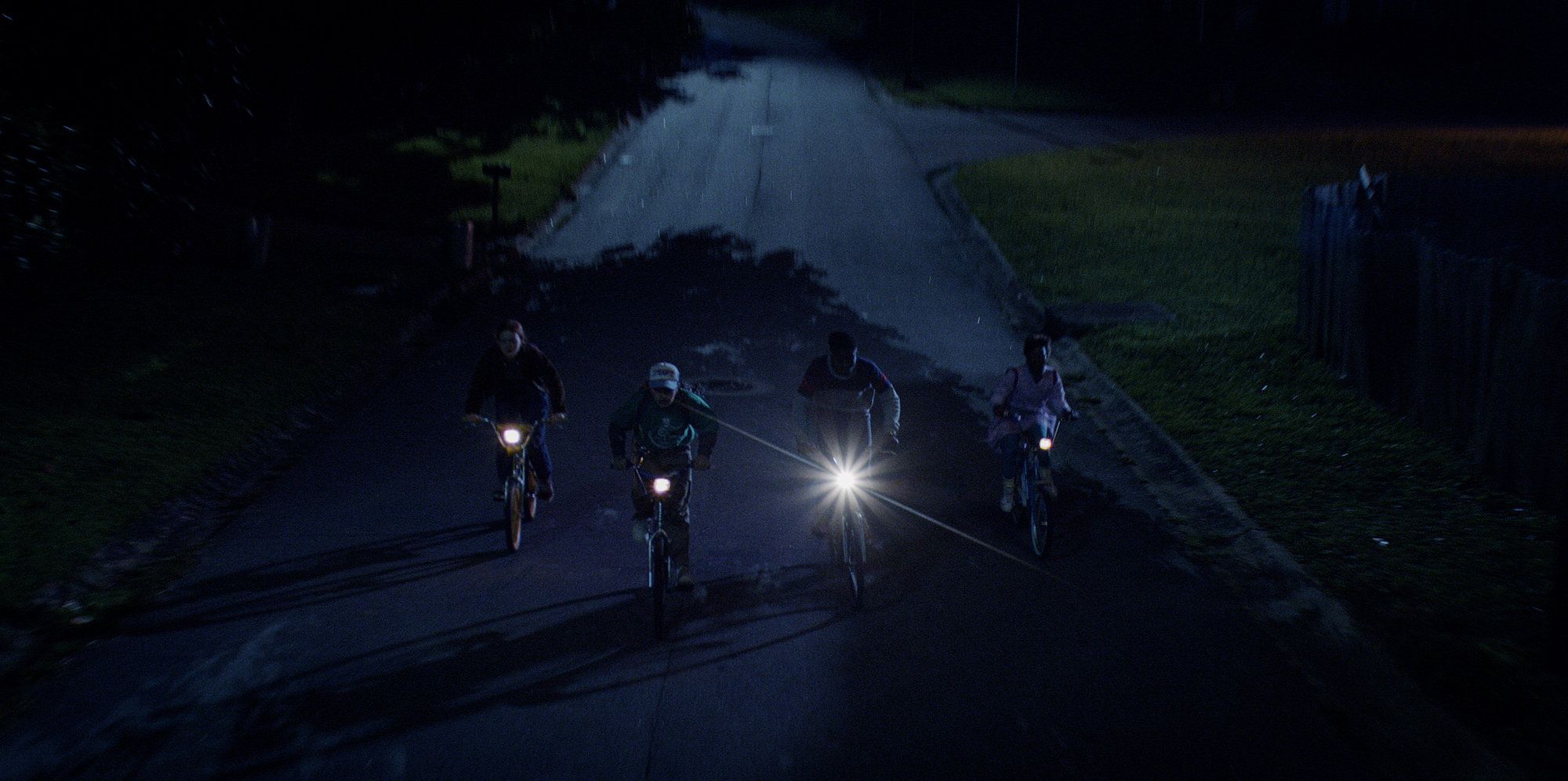 'Stranger Things' cast ride their bikes at night
