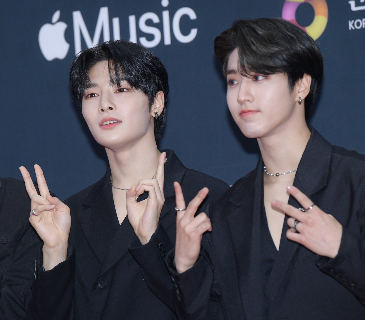 Stray Kids members I.N and Han pose on the red carpet of the MAMA Awards in Paju, South Korea.