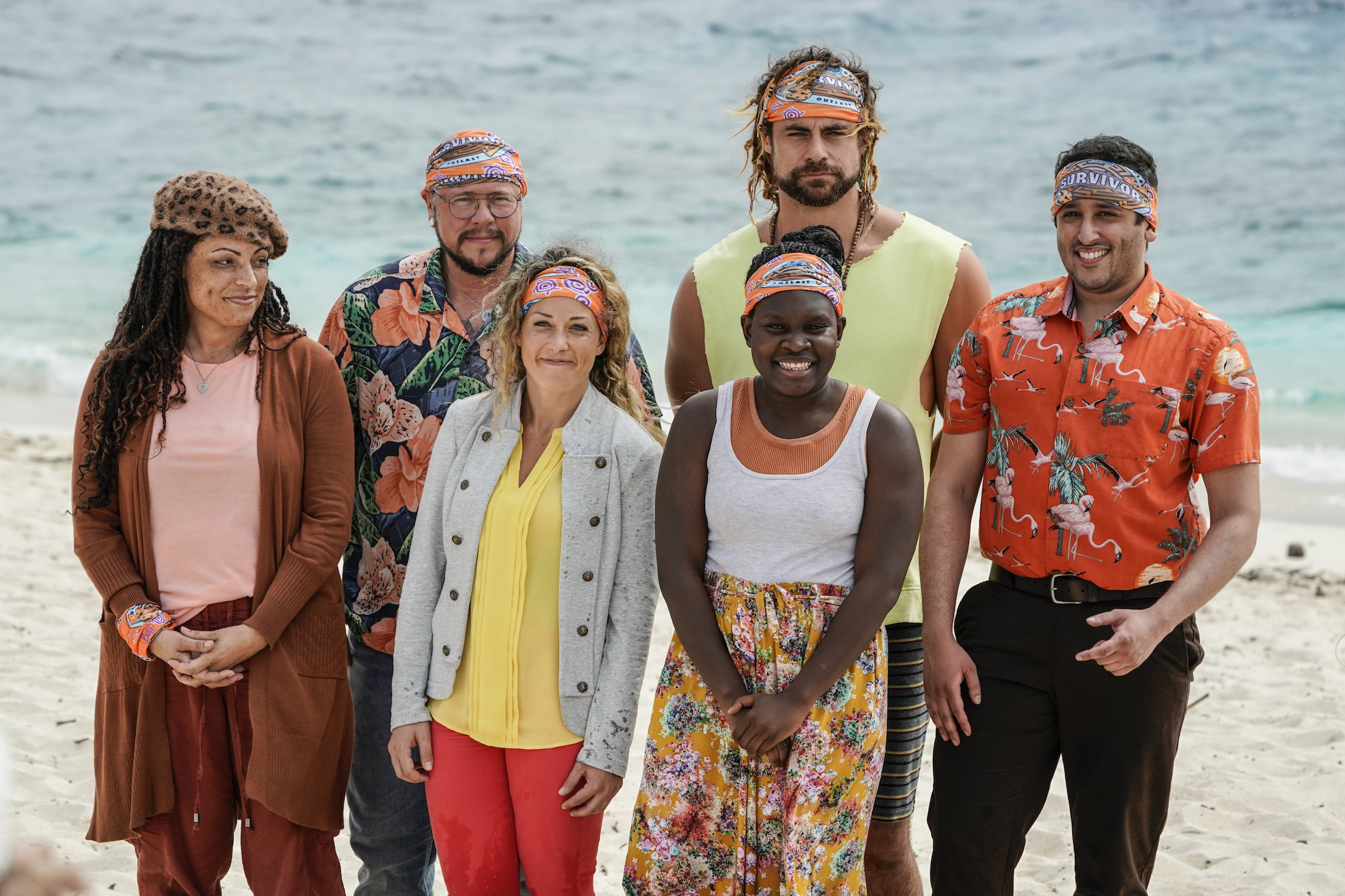 The 'Survivor' Season 42 cast members on the Taku Tribe, including Jackson Fox, smiling on the beach together