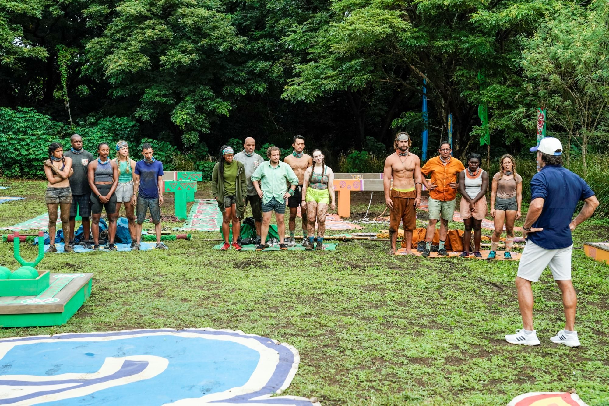 The three tribes of 'Survivor' Season 42 stand on their individual mats and listen to Jeff Probst speak during the immunity challenge.