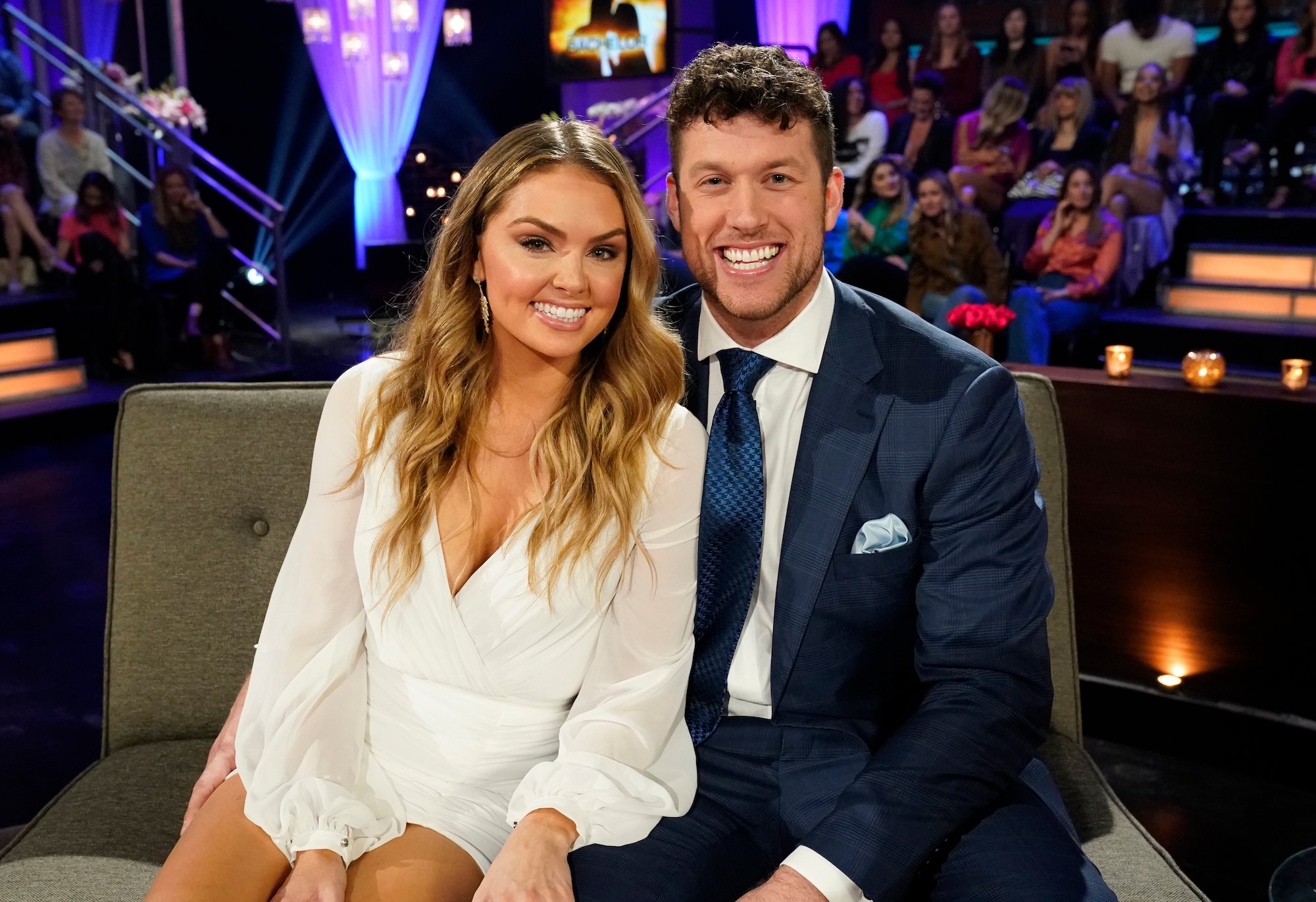 'The Bachelor' couple Susie and Clayton at the finale, sitting next to one another on stage.