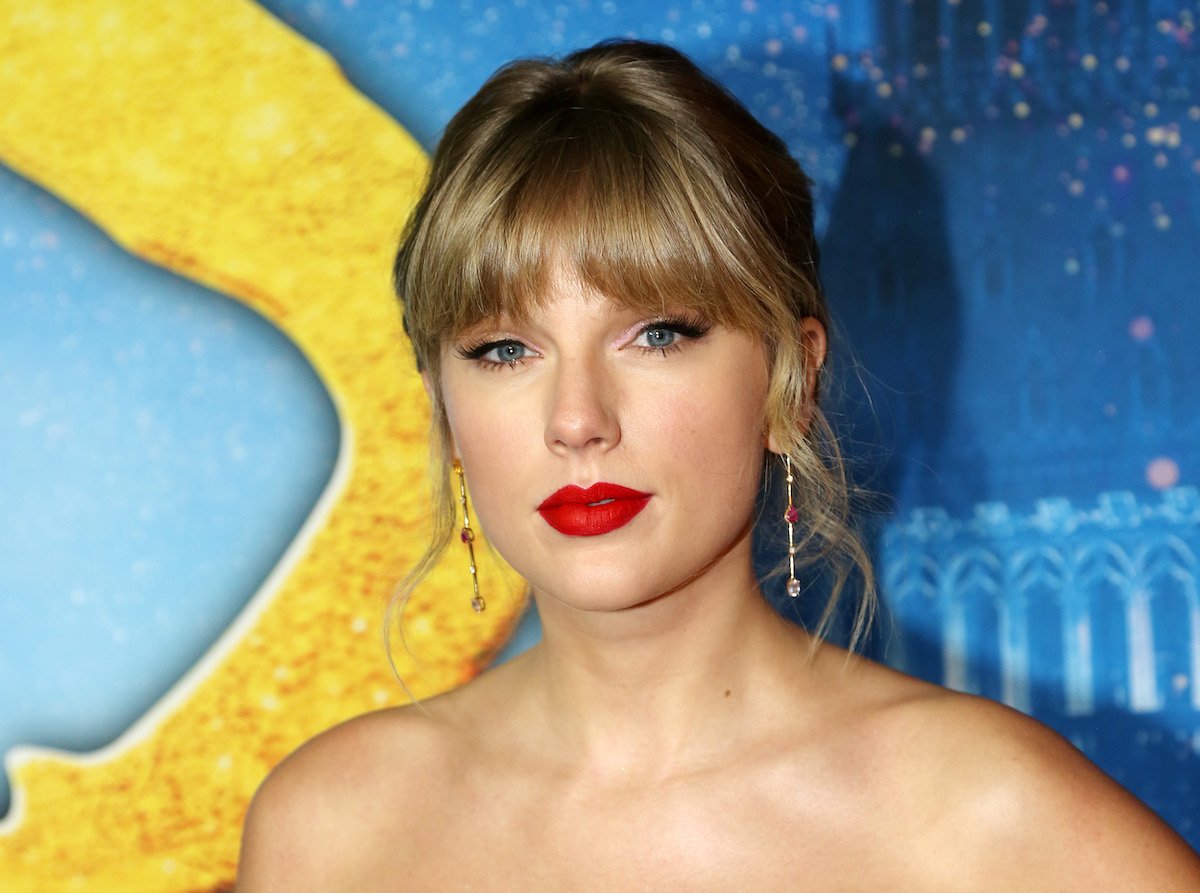Taylor Swift poses at an event.