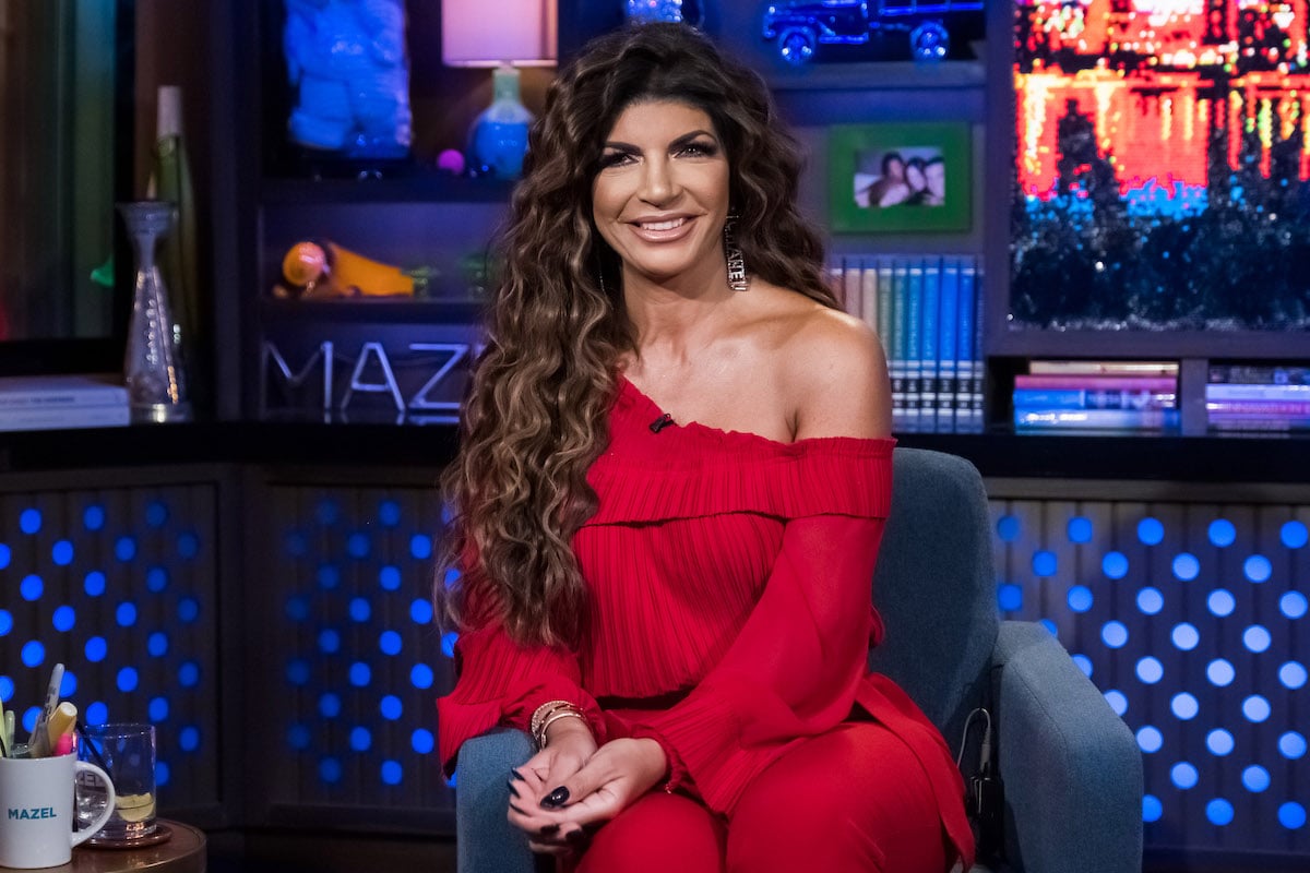 Teresa Giudice smiles and poses on the set of "Watch What Happens Live."