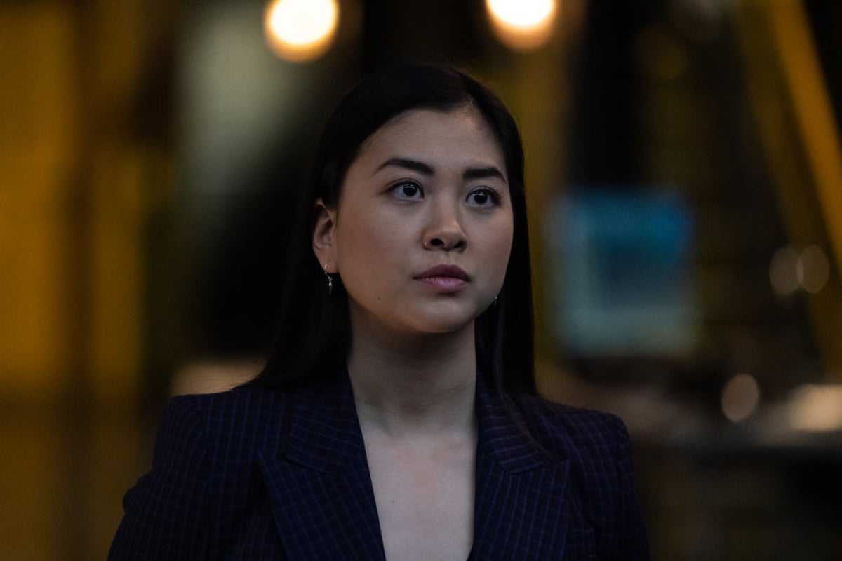 Laura Sohn as Agent Park in The Blacklist Season 9. Park wears a black suit jacket. 
