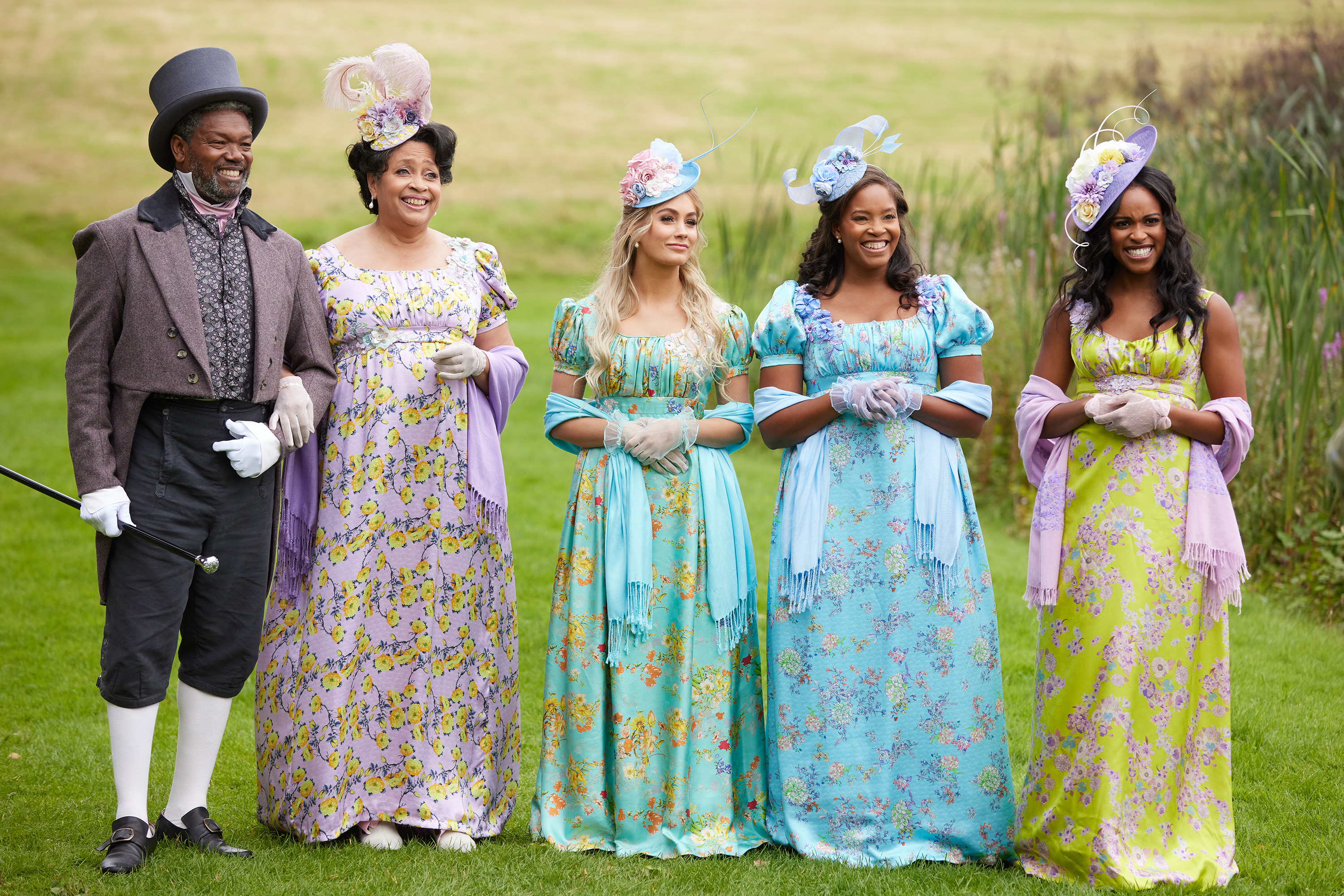 Nicole Remy, far right, standing in a line with her parents, friend Tessa, and sister Danie, all in Regency dress, in 'The Courtship'