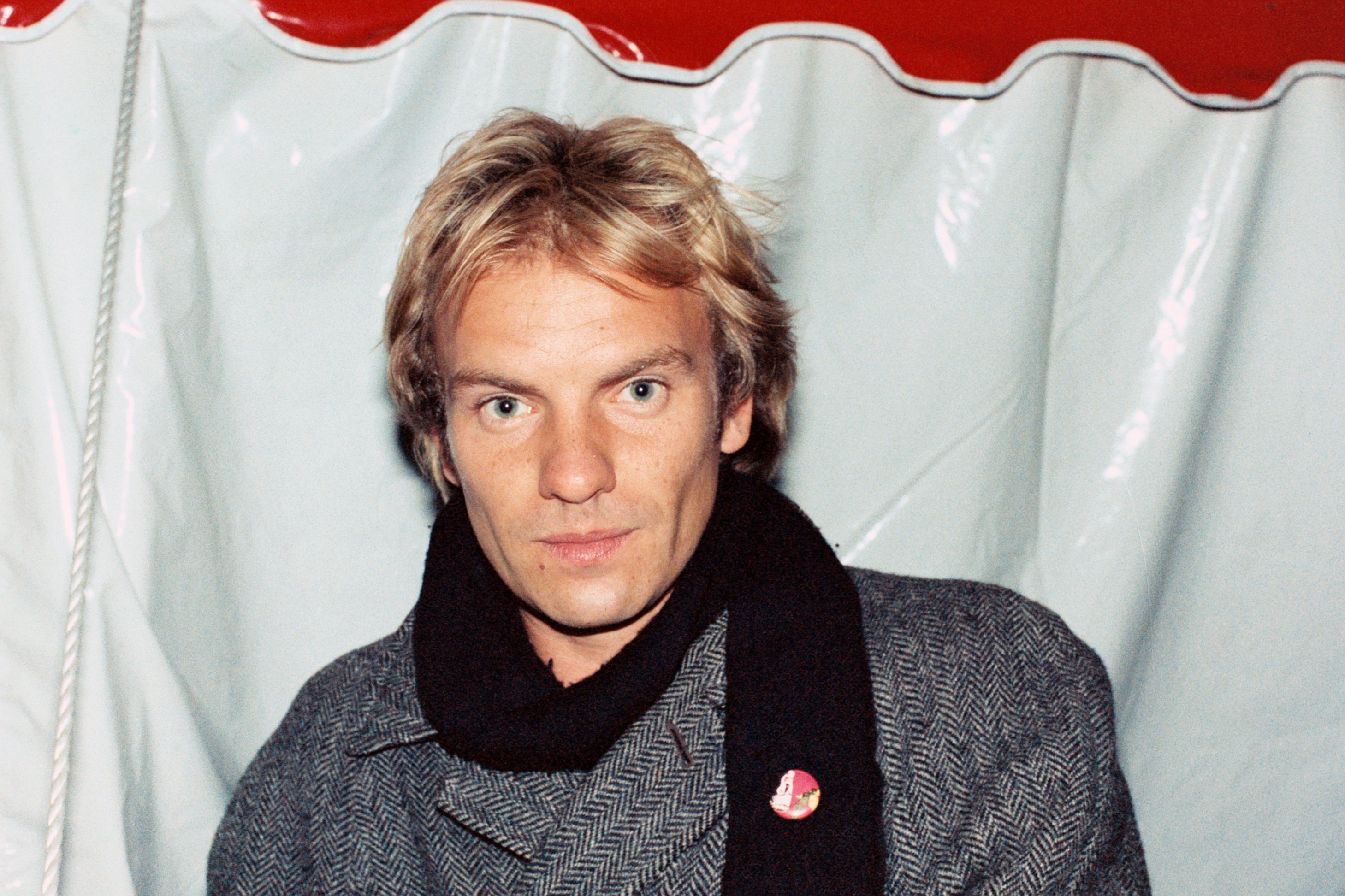 The Police's Sting wearing a scarf