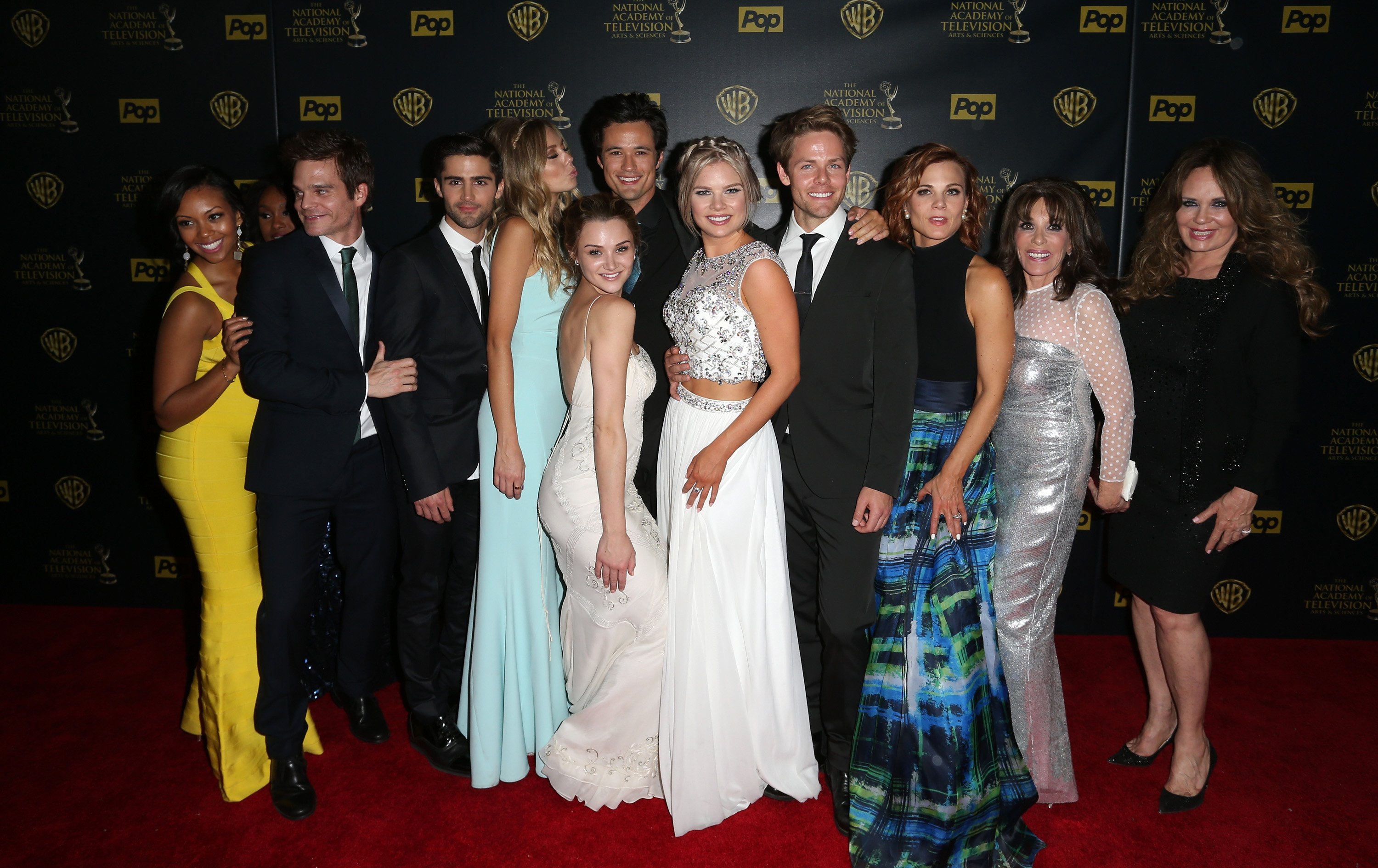 'The Young and the Restless' cast poses for a group photo on the red carpet.