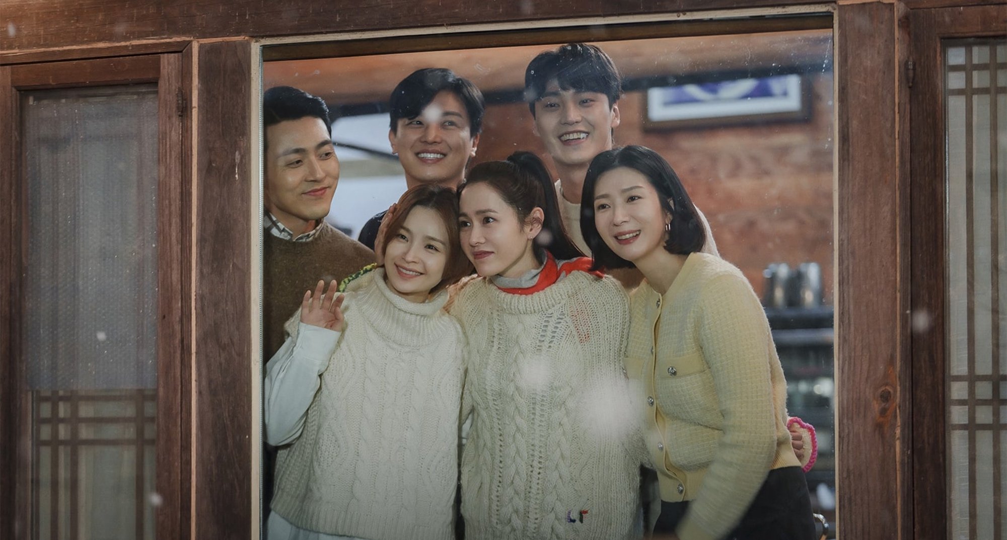 'Thirty-Nine' K-drama main cast huddled together in front of window.