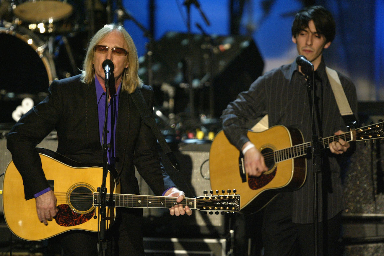 Tom Petty and Dhani Harrison performing during George Harrison's posthumous Rock & Roll Hall of Fame induction in 2004.