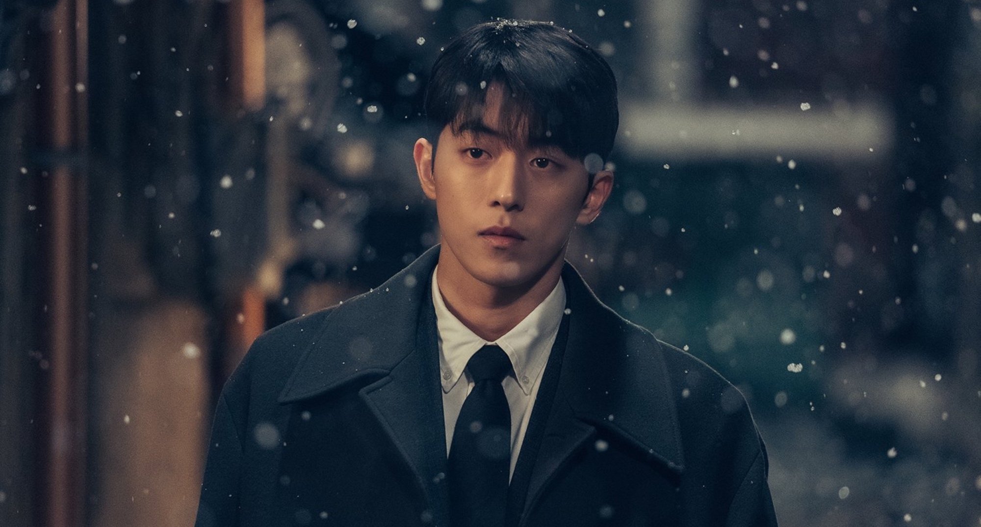 'Twenty-Five Twenty-One' K-drama character Baek Yi-Jin theories wearing suit and tie.