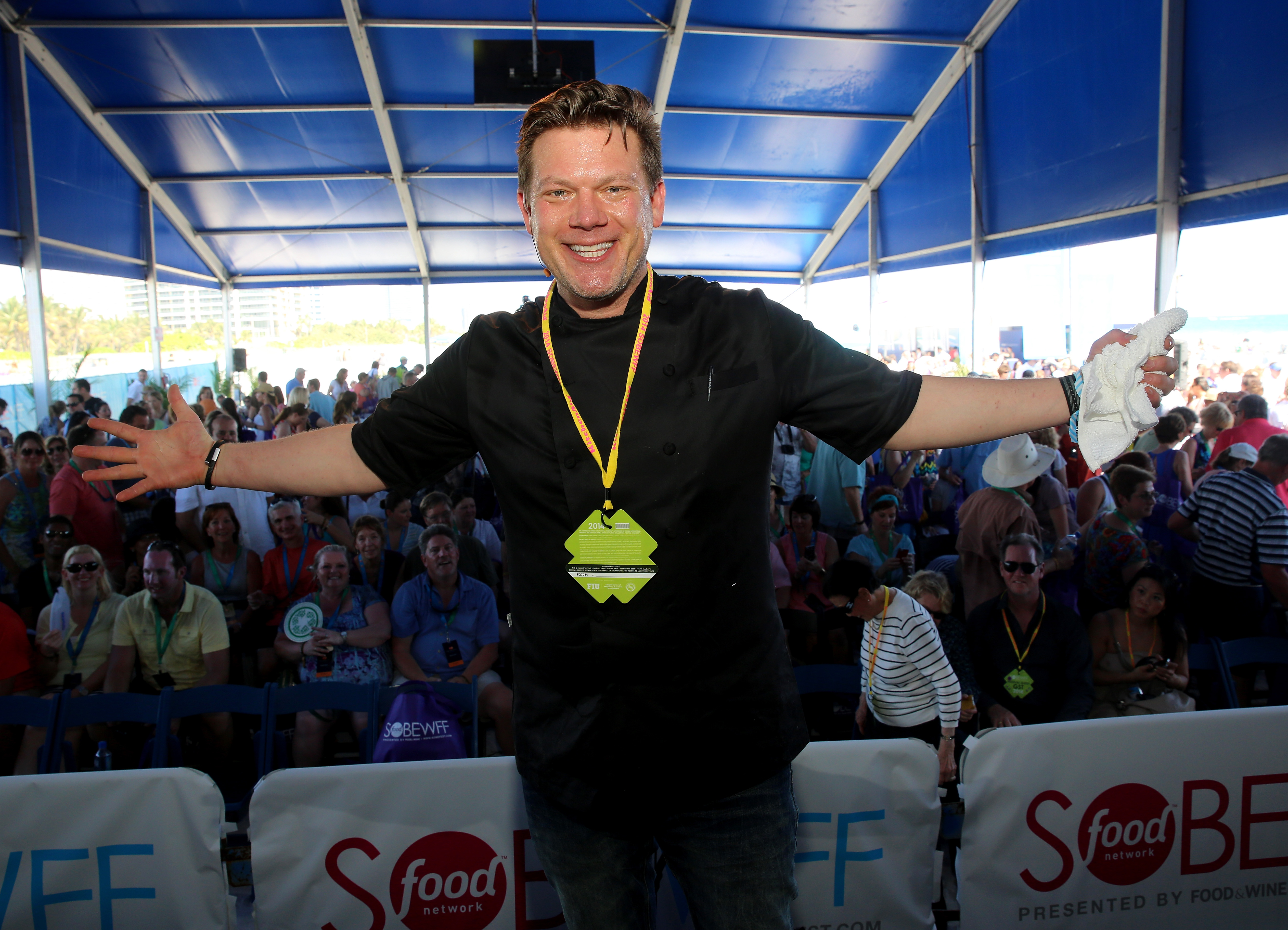 Food Network personality Tyler Florence wears a black T-shirt in this photograph.