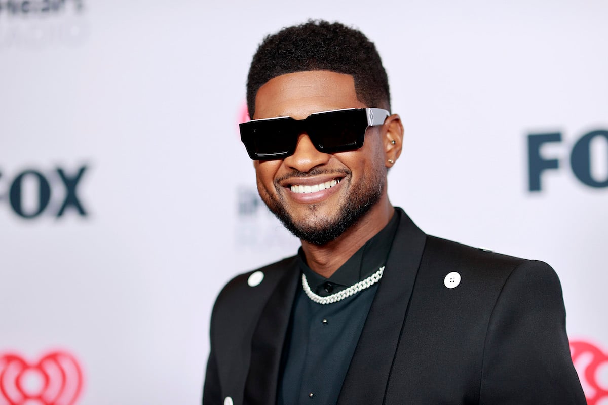 Usher wearing sunglasses